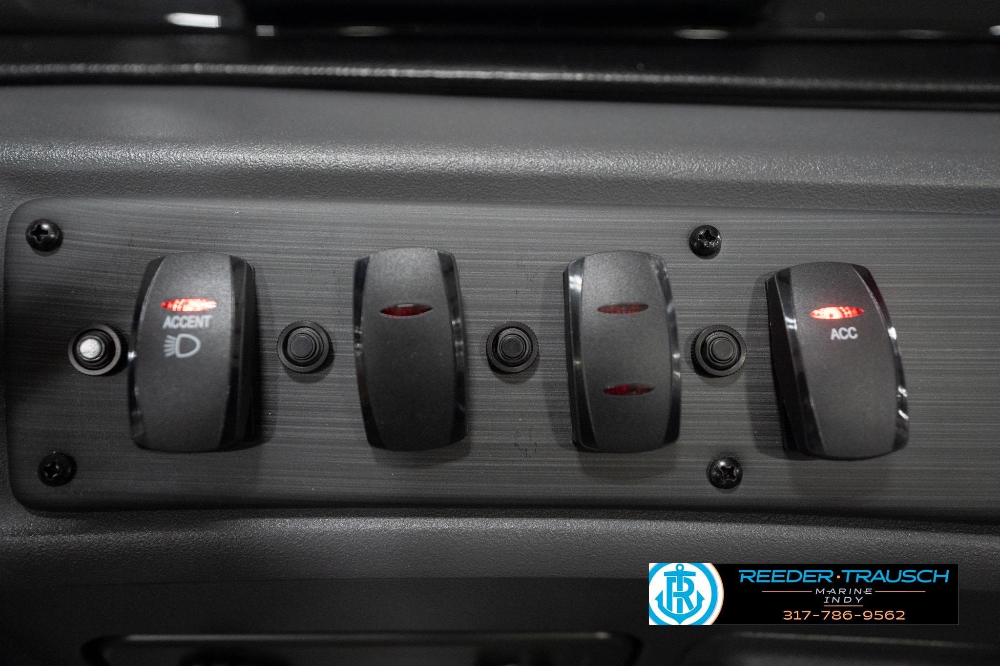 Control panel of 2026 Bennington 20 SL boat with labeled switches.