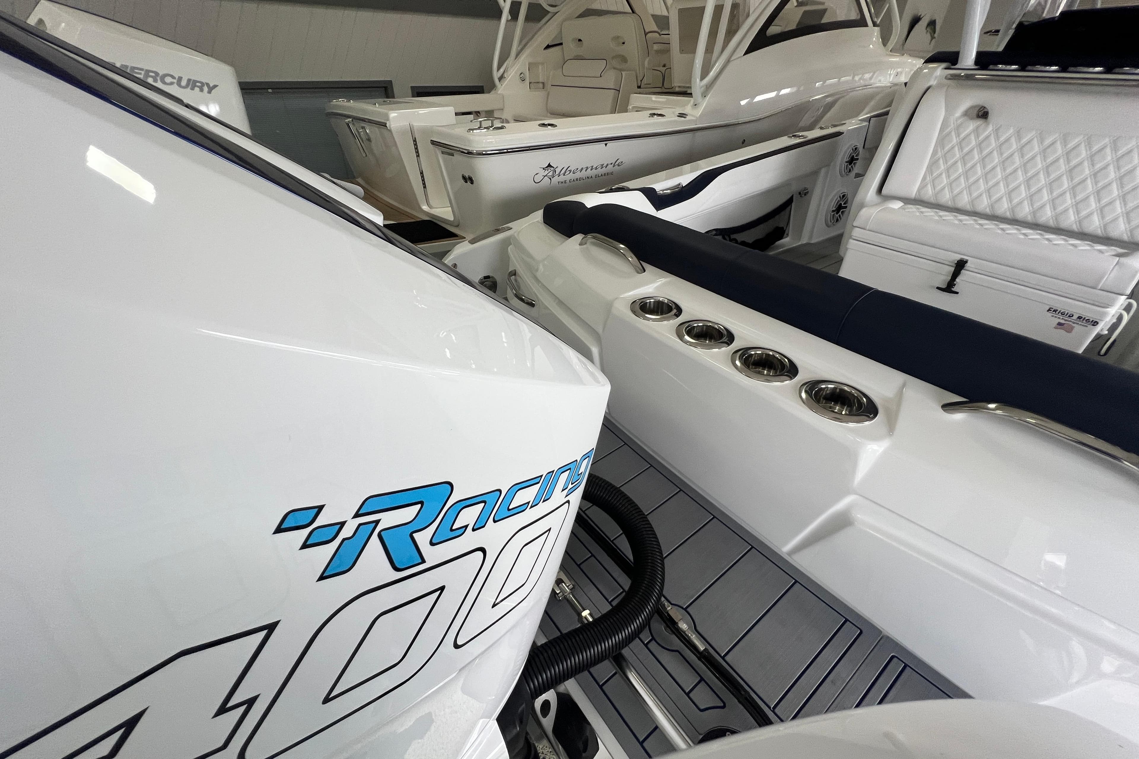 2026 Nor-Tech 340 Sport boat interior with Mercury Racing 400 engine, featuring sleek design and luxury seating.