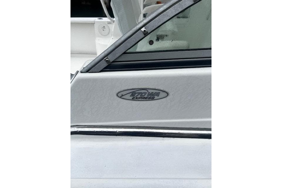 2007 Sea Pro 270 Walk Around boat detail with model emblem visible.