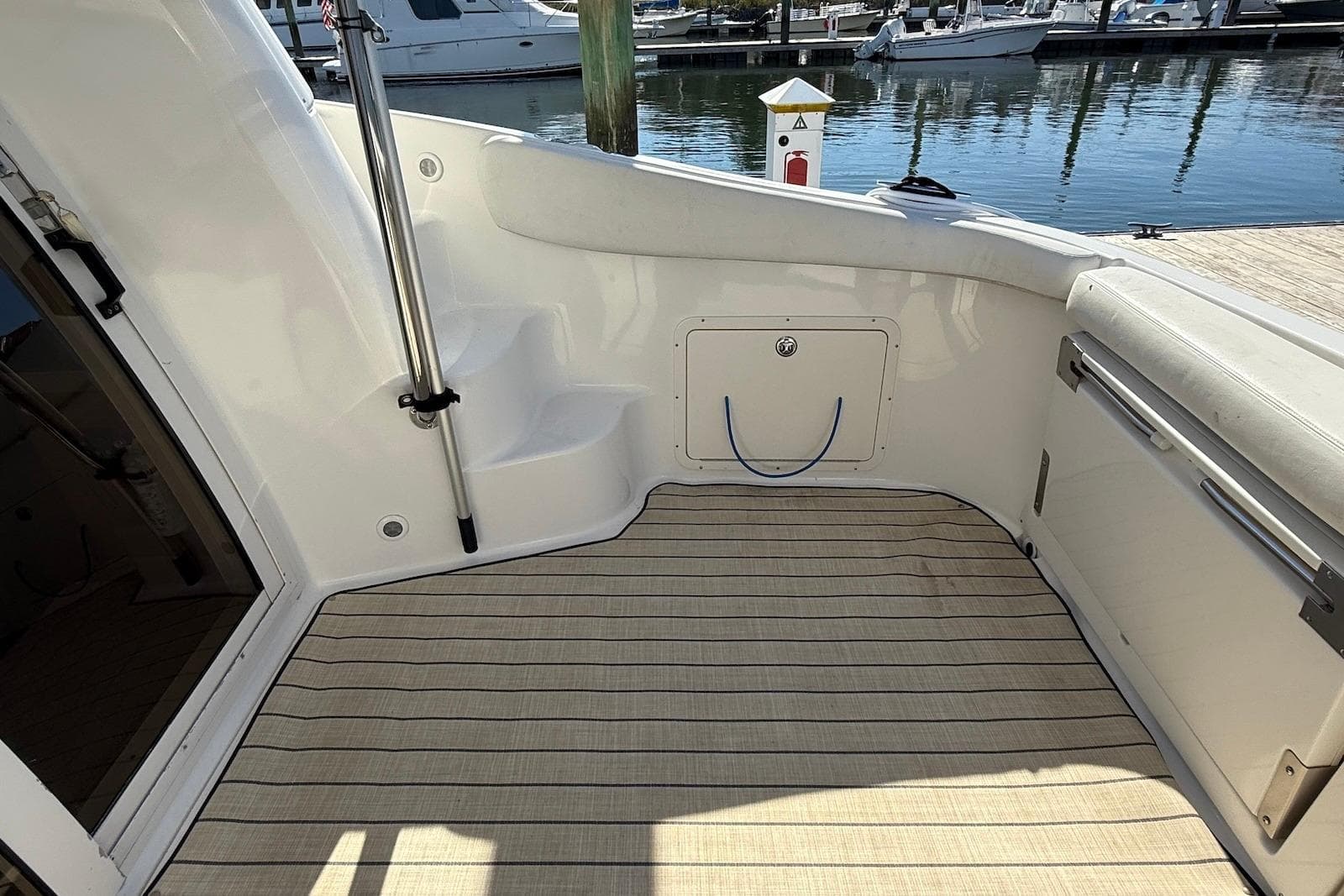 2003 Regal Commodore 3880 boat interior with steps and dock view.