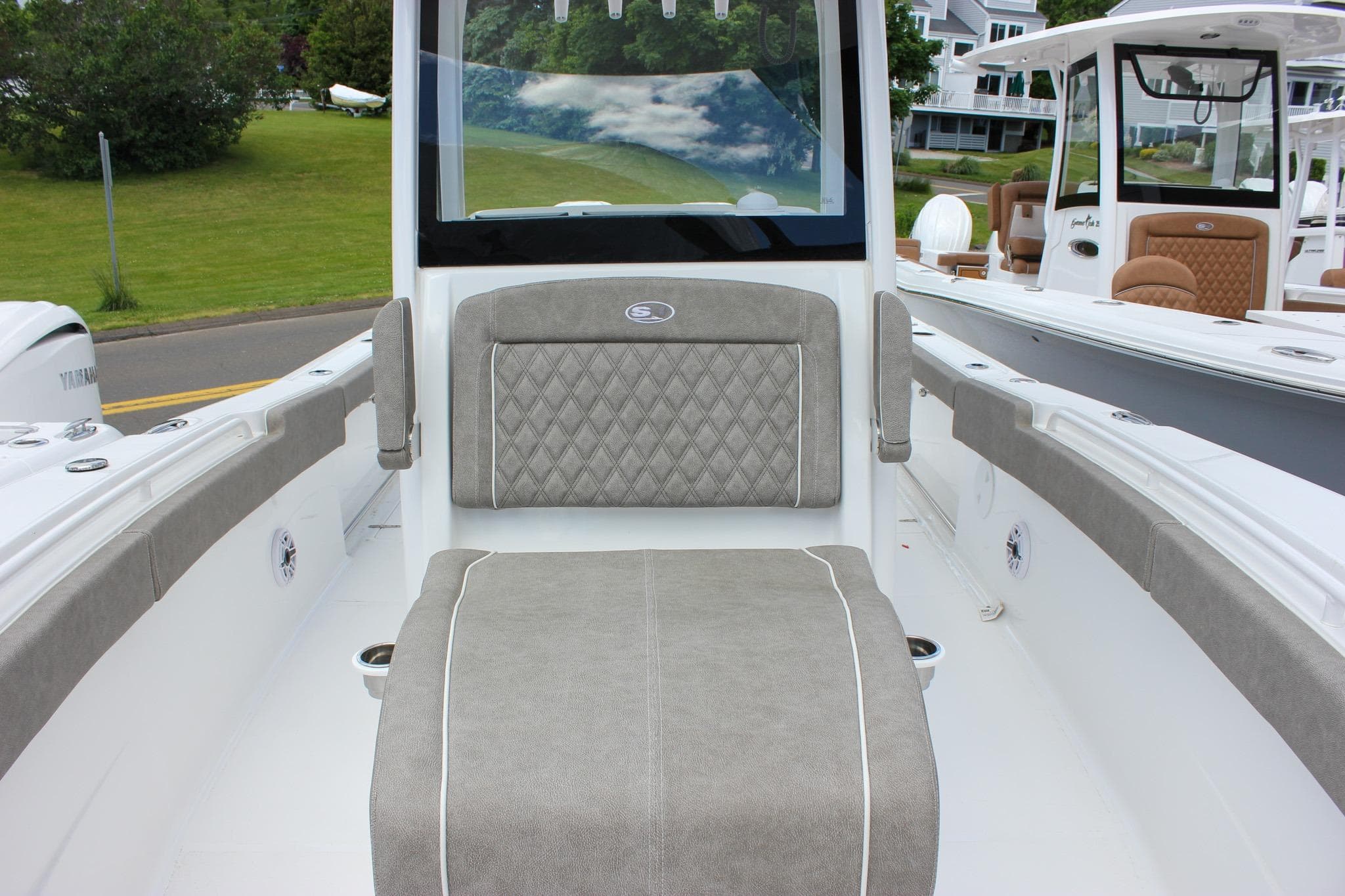 2027 Sea Hunt Ultra 275 Coffin Box boat interior with cushioned seating and sleek design.