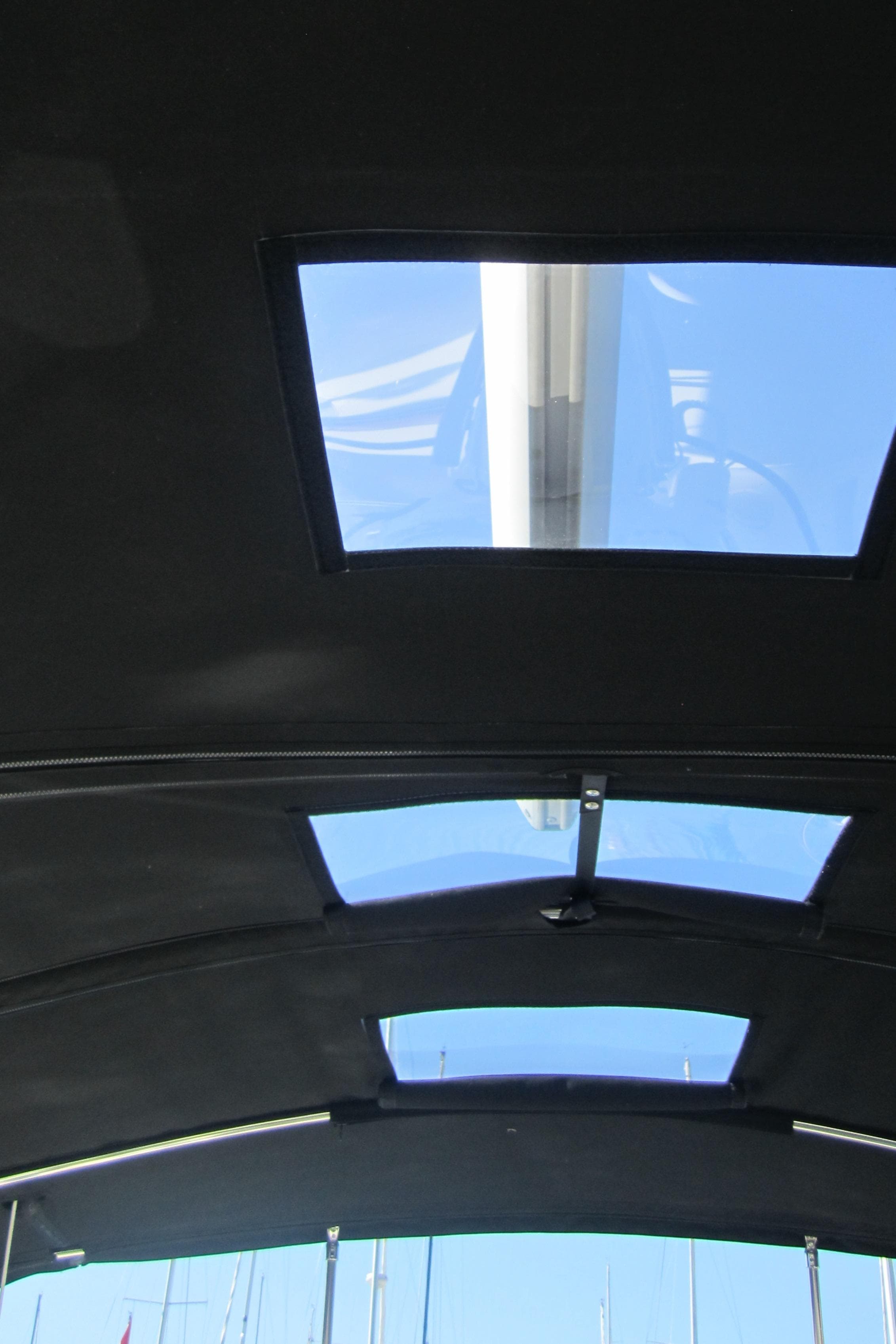 Interior view of 2007 Beneteau 423 sailboat with skylights and mast visible.
