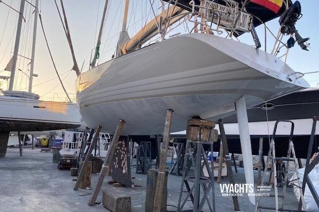 1997 X-Yachts X-412 sailboat on stands in a marina, under maintenance.