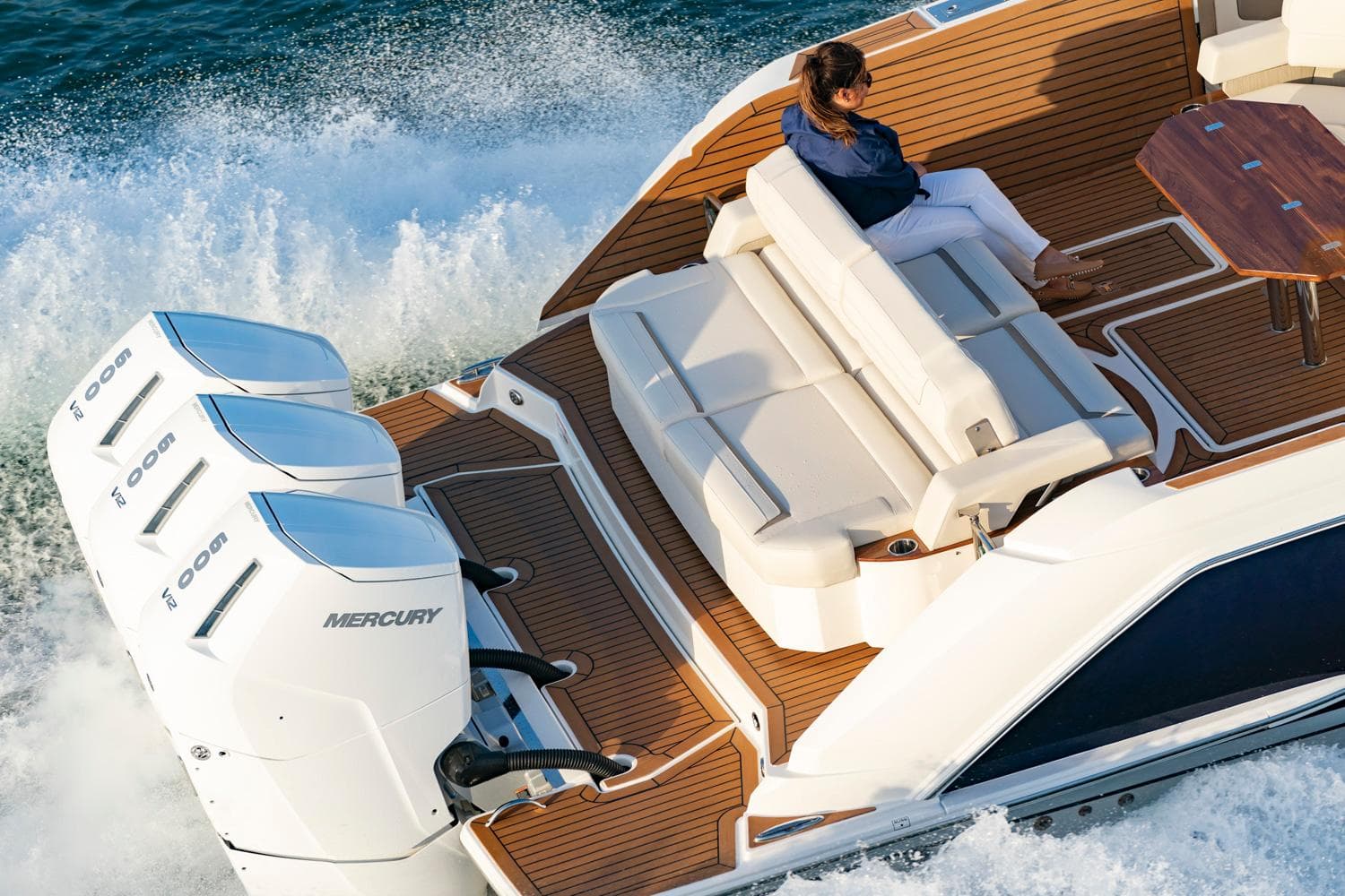 Manufacturer Provided Image: 2025 Tiara Yachts 48 LS cruising with powerful Mercury engines, featuring luxurious seating and teak deck.
