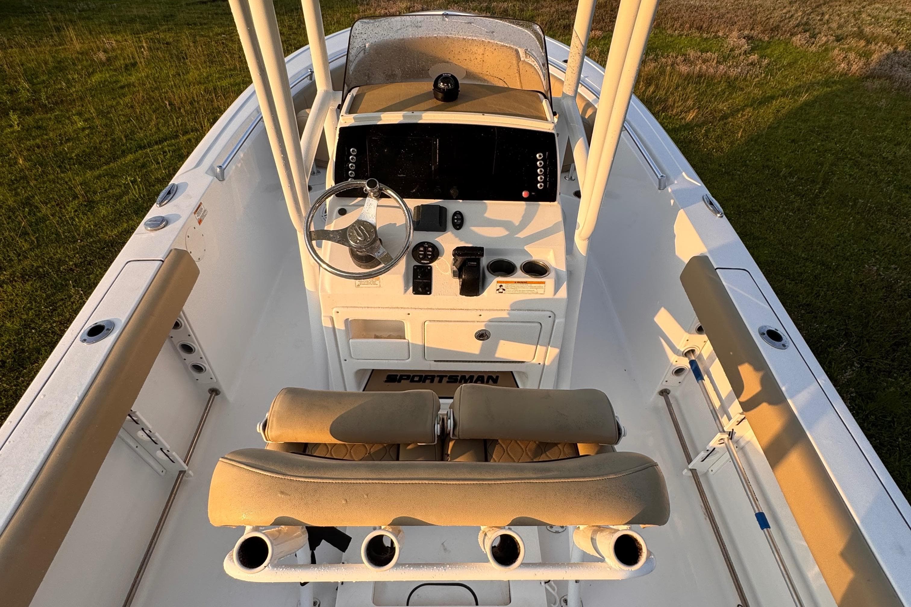 2019 Sportsman 231 Heritage Platinum boat interior with helm and seating.