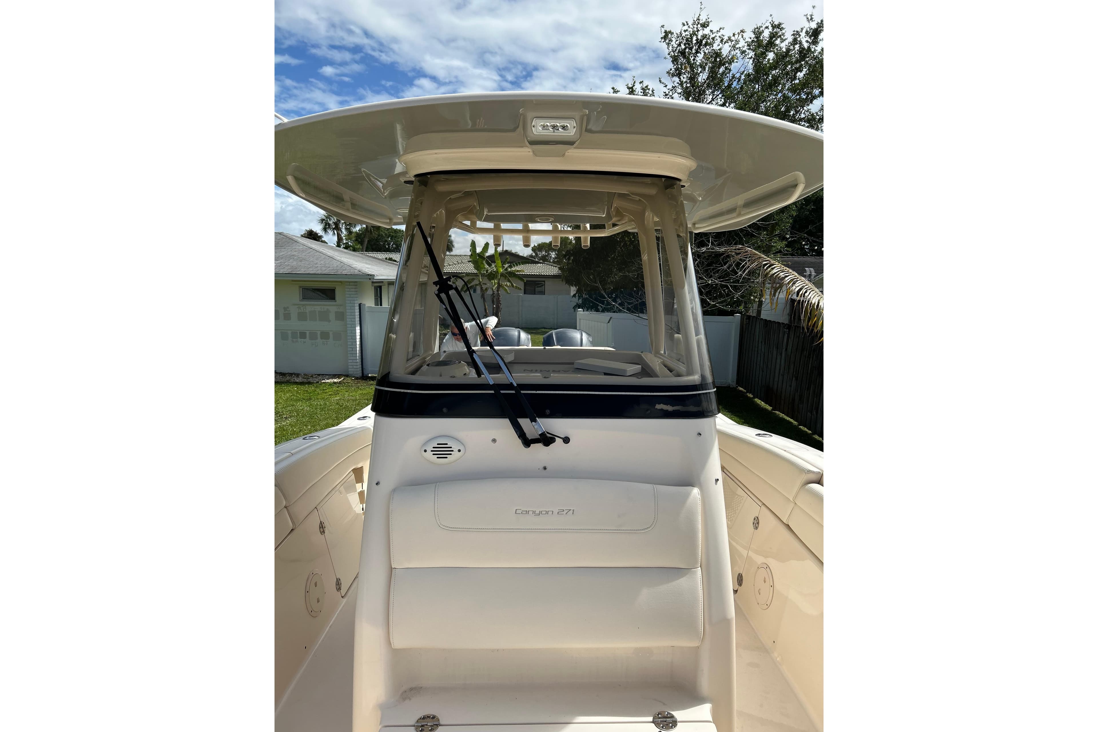 2021 Grady-White Canyon 271 FS boat, featuring a sleek design and spacious deck.