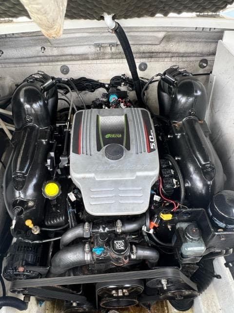 2013 Sea Ray 240 Sundeck engine compartment with a powerful 5.0L motor.
