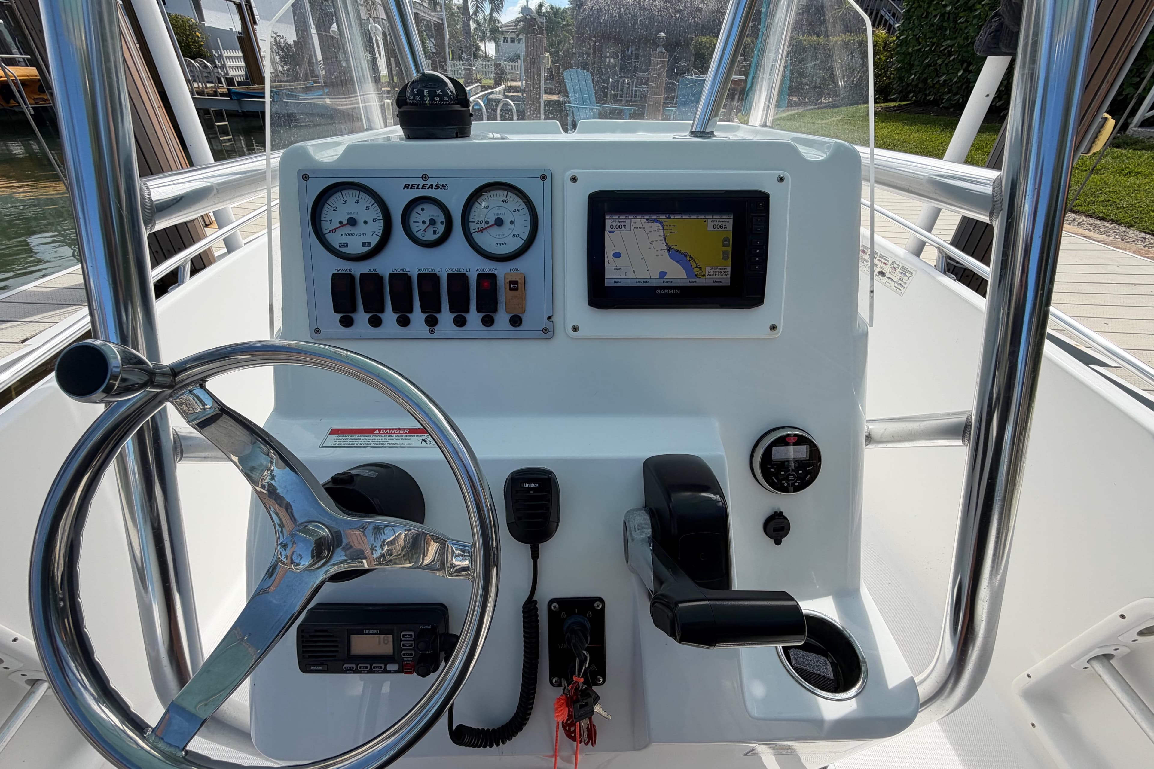 Steering console of a 2017 Release 196 RX boat with navigation and control instruments.