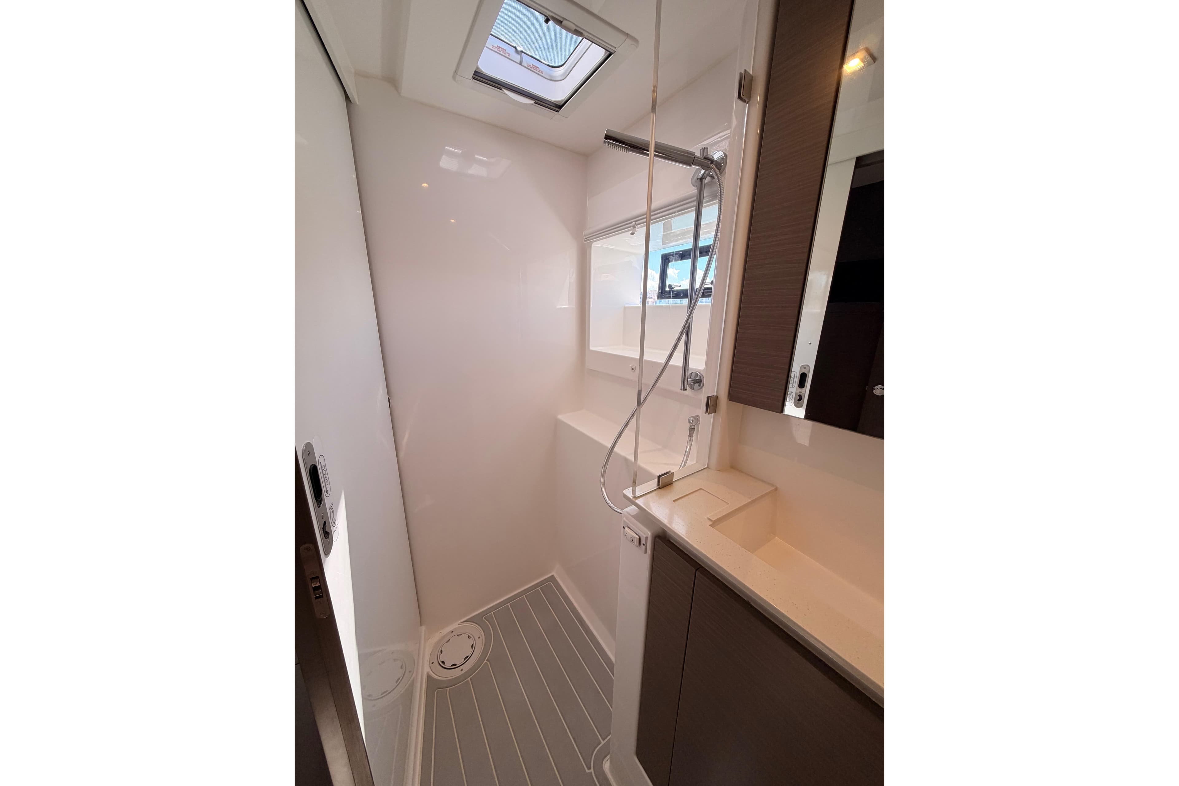 Modern shower area in 2023 Leopard 50 yacht with sleek design and skylight.