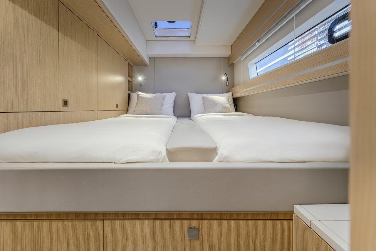 Luxurious bedroom in Privilege Signature 510 yacht, model year 2025.