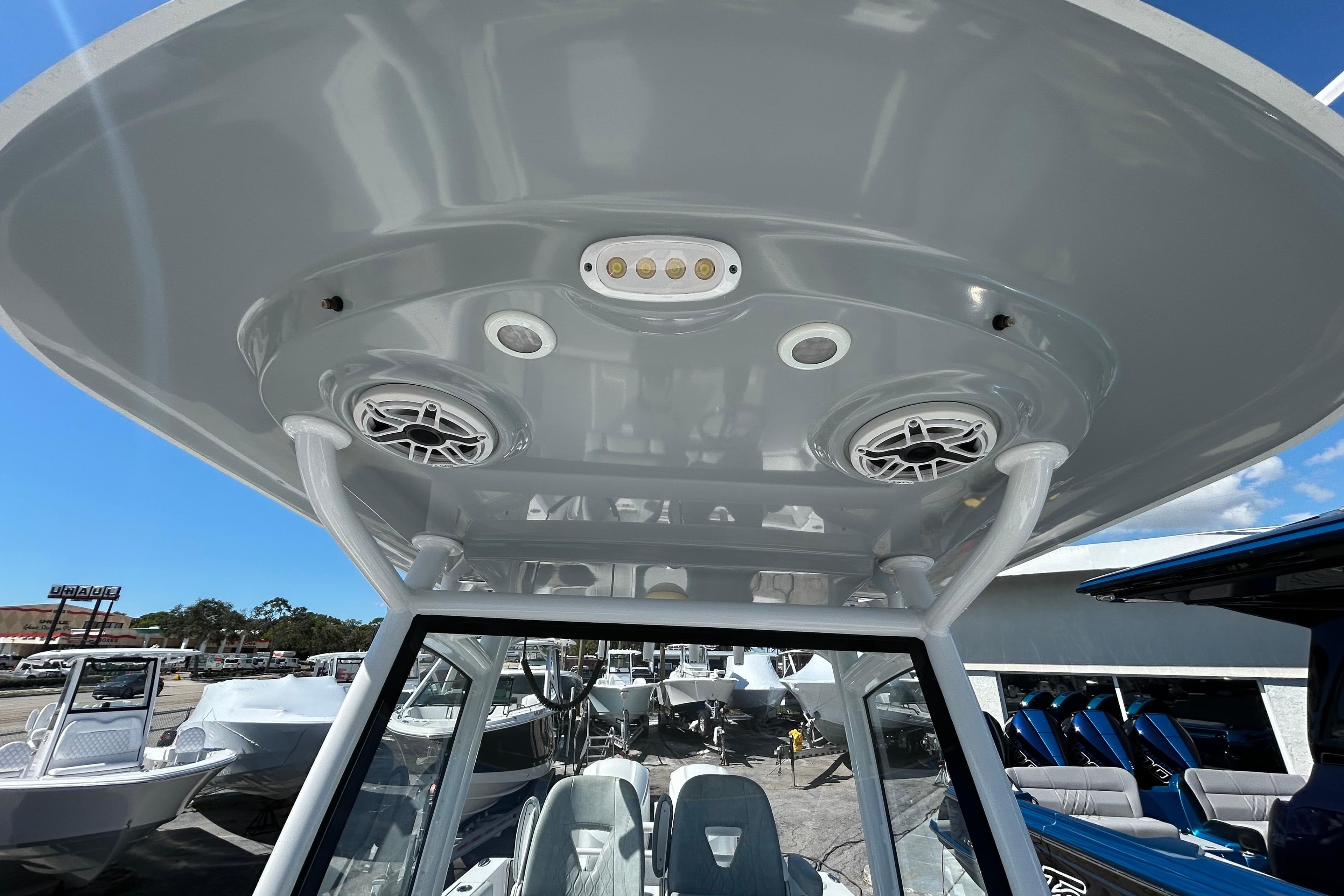 2019 Sportsman Open 282 Center Console boat interior with speakers and lighting.
