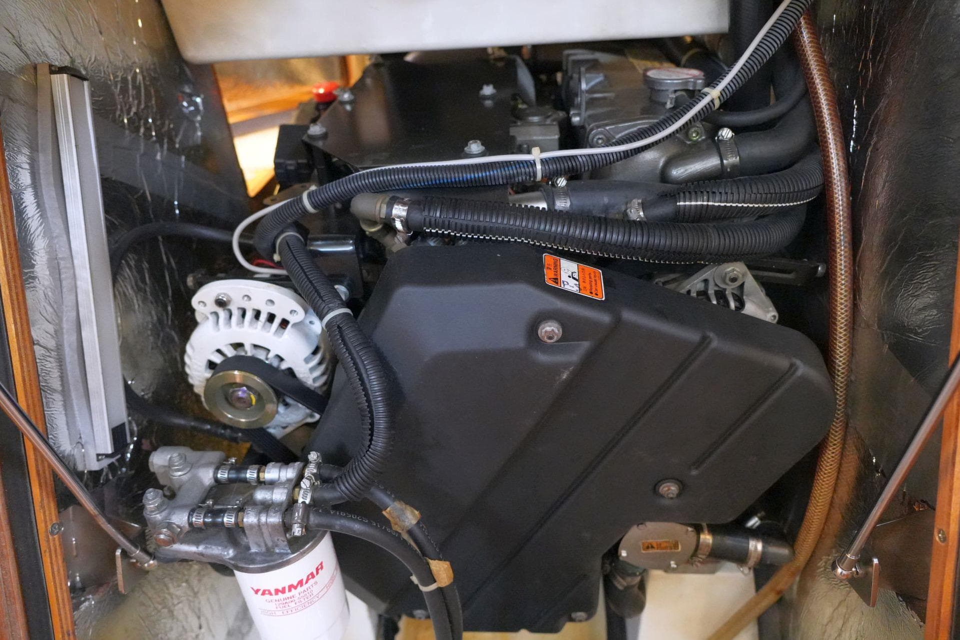 Engine compartment of 2016 X-Yachts XC-45 MK II sailboat, featuring Yanmar components.