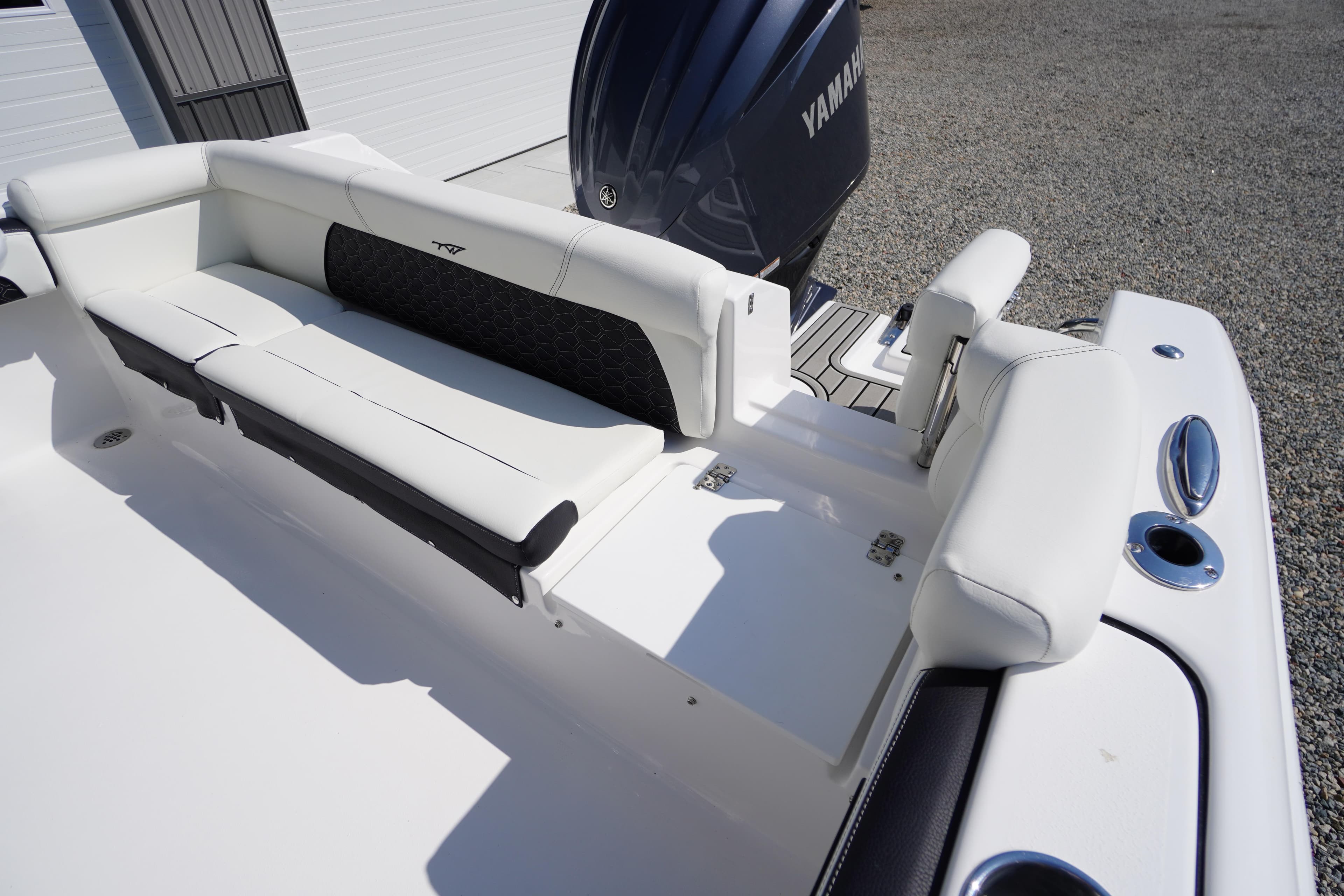 2026 Tidewater 220 LXF boat with white seating and Yamaha engine.