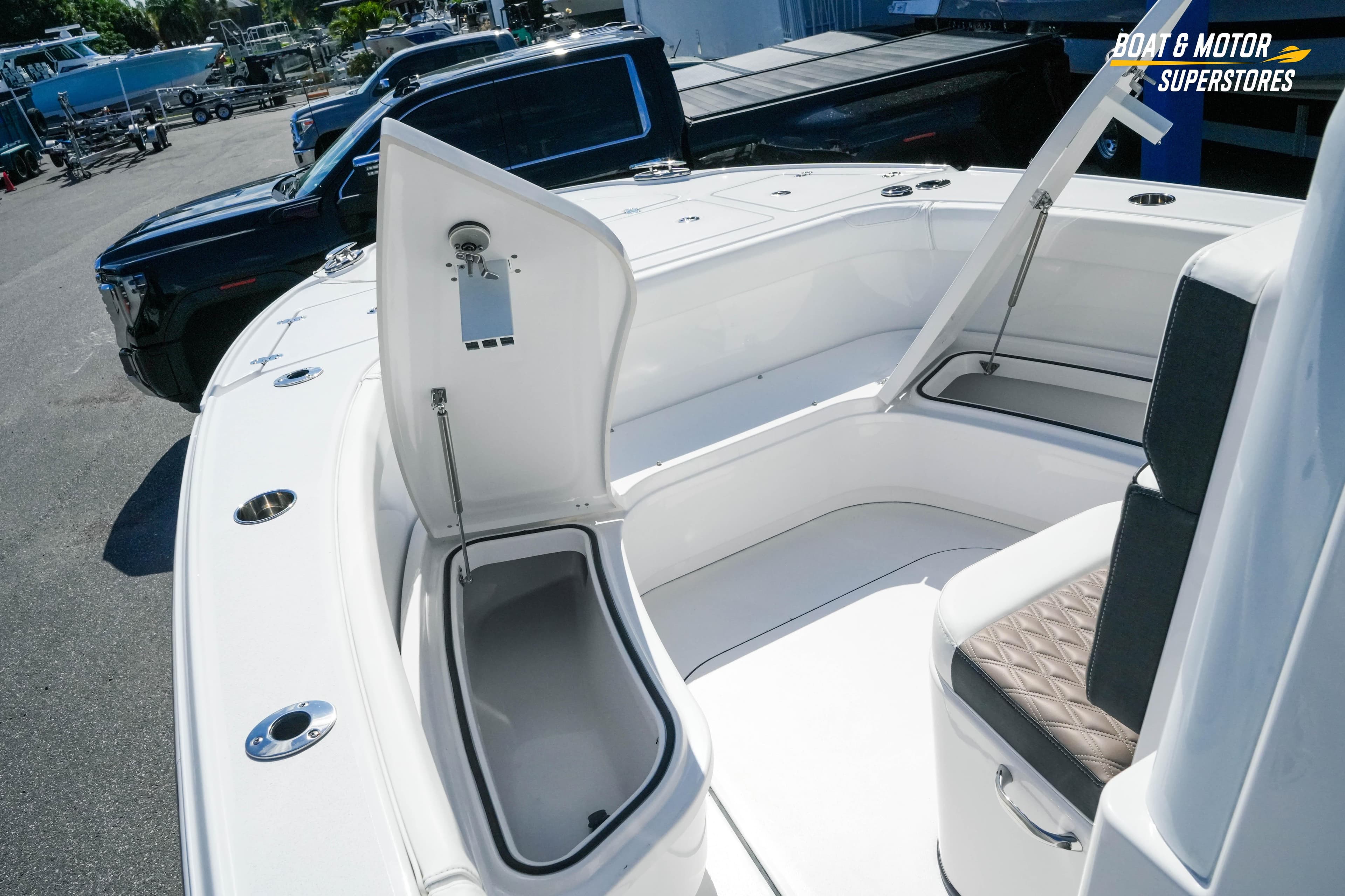 2025 Blackfin 262 HB boat interior with open storage compartment and seating.