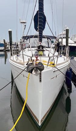 2018 Jeanneau Sun Odyssey 389 sailboat docked in marina.