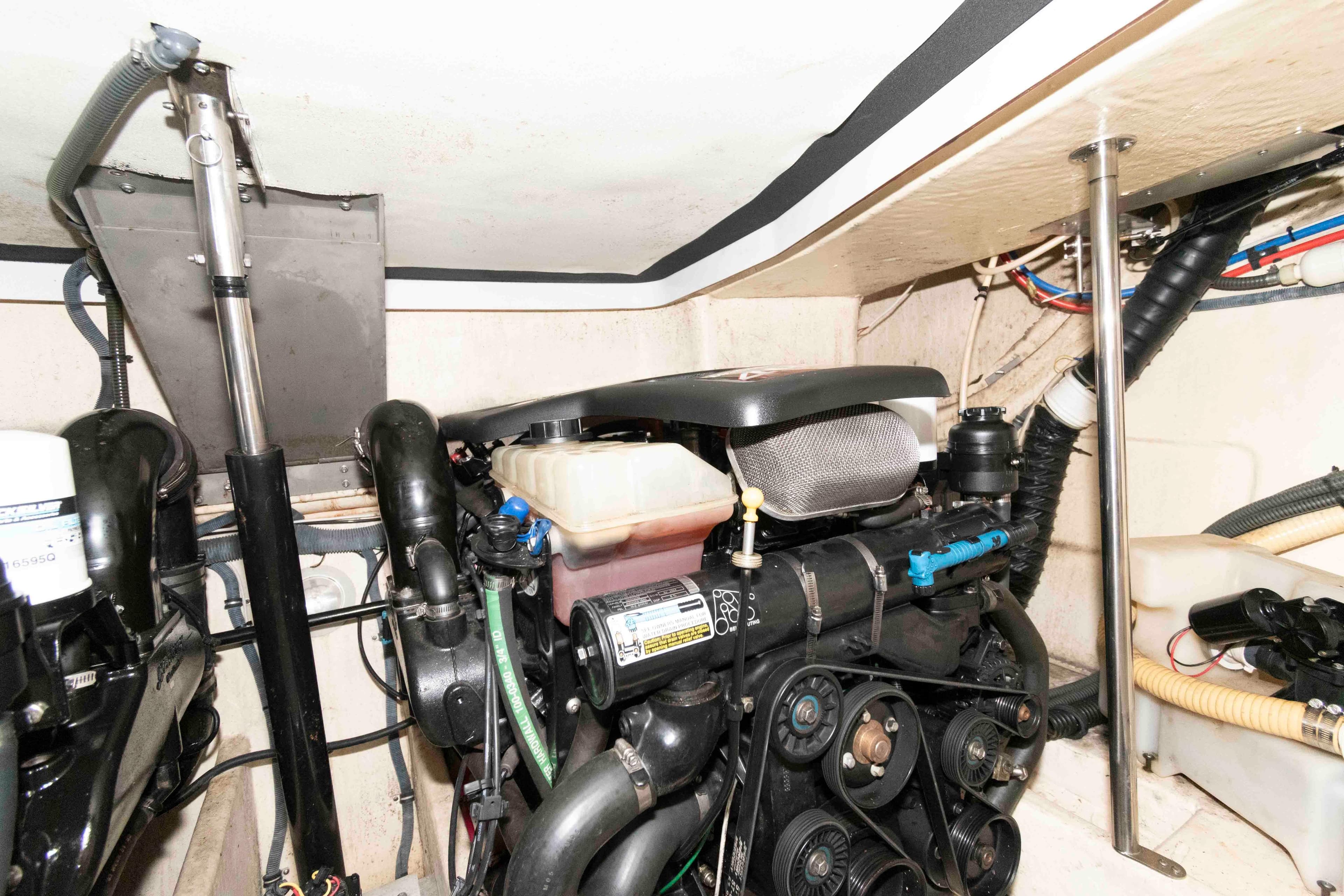 Engine room of a 2004 Formula 37 Performance Cruiser, showcasing mechanical components.