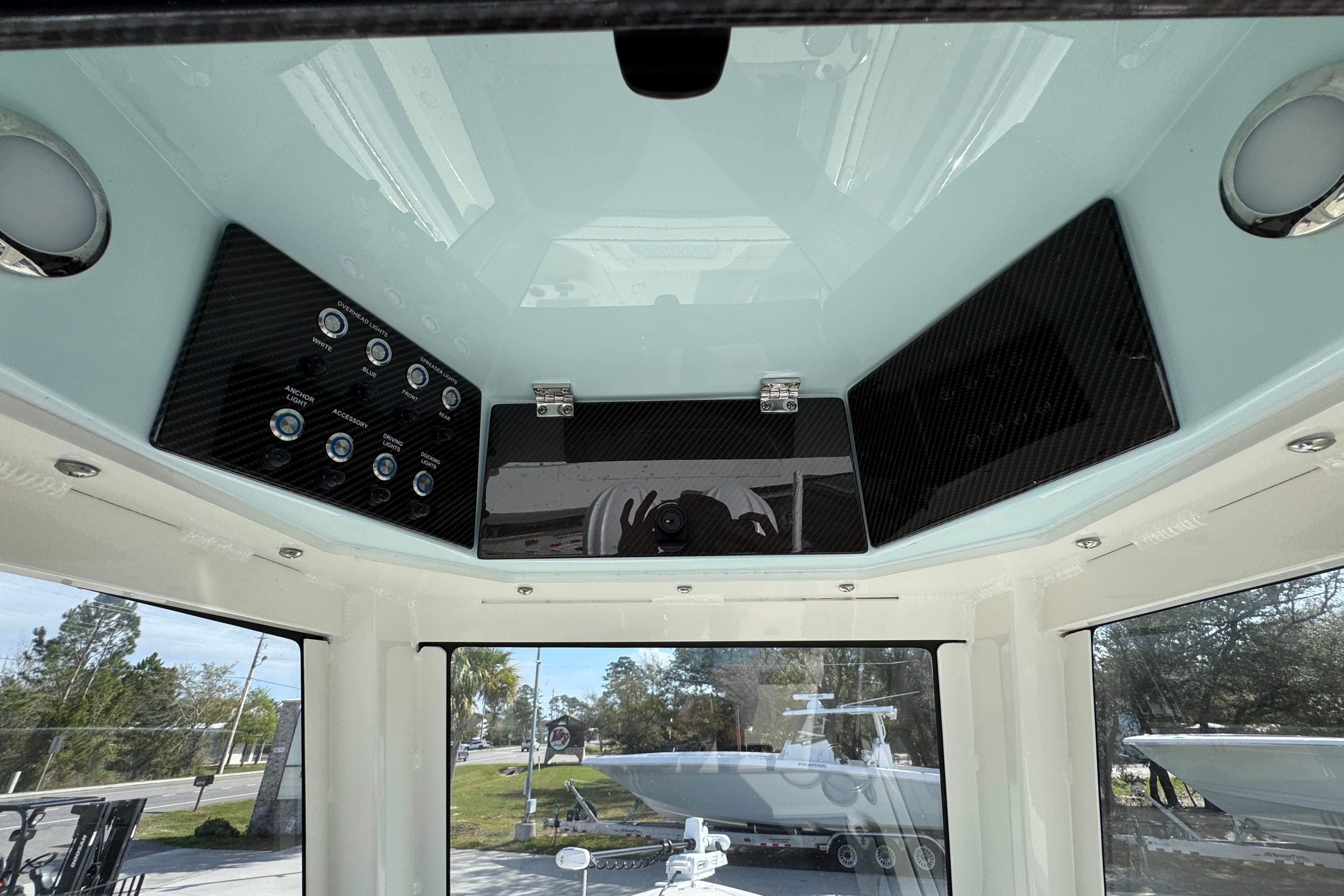 2026 Blackwood 270 LXF boat interior with control panel and overhead storage.