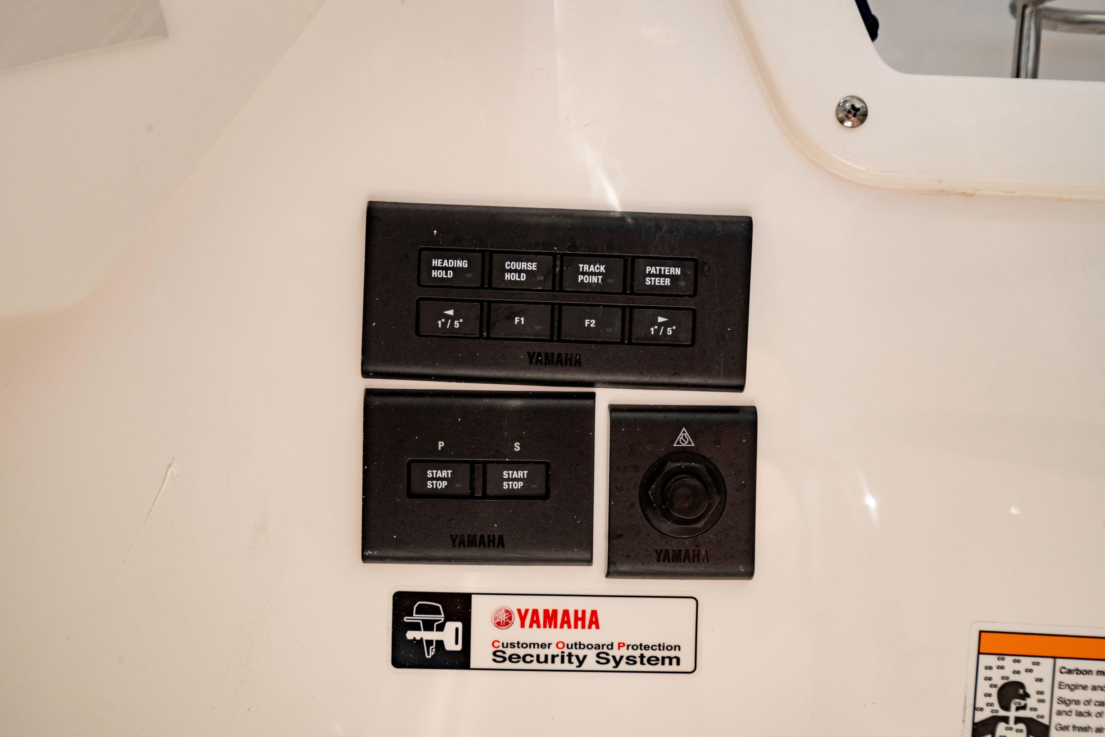 Yamaha control panel on 2026 Edgewater 262CX Crossover boat, featuring security system.