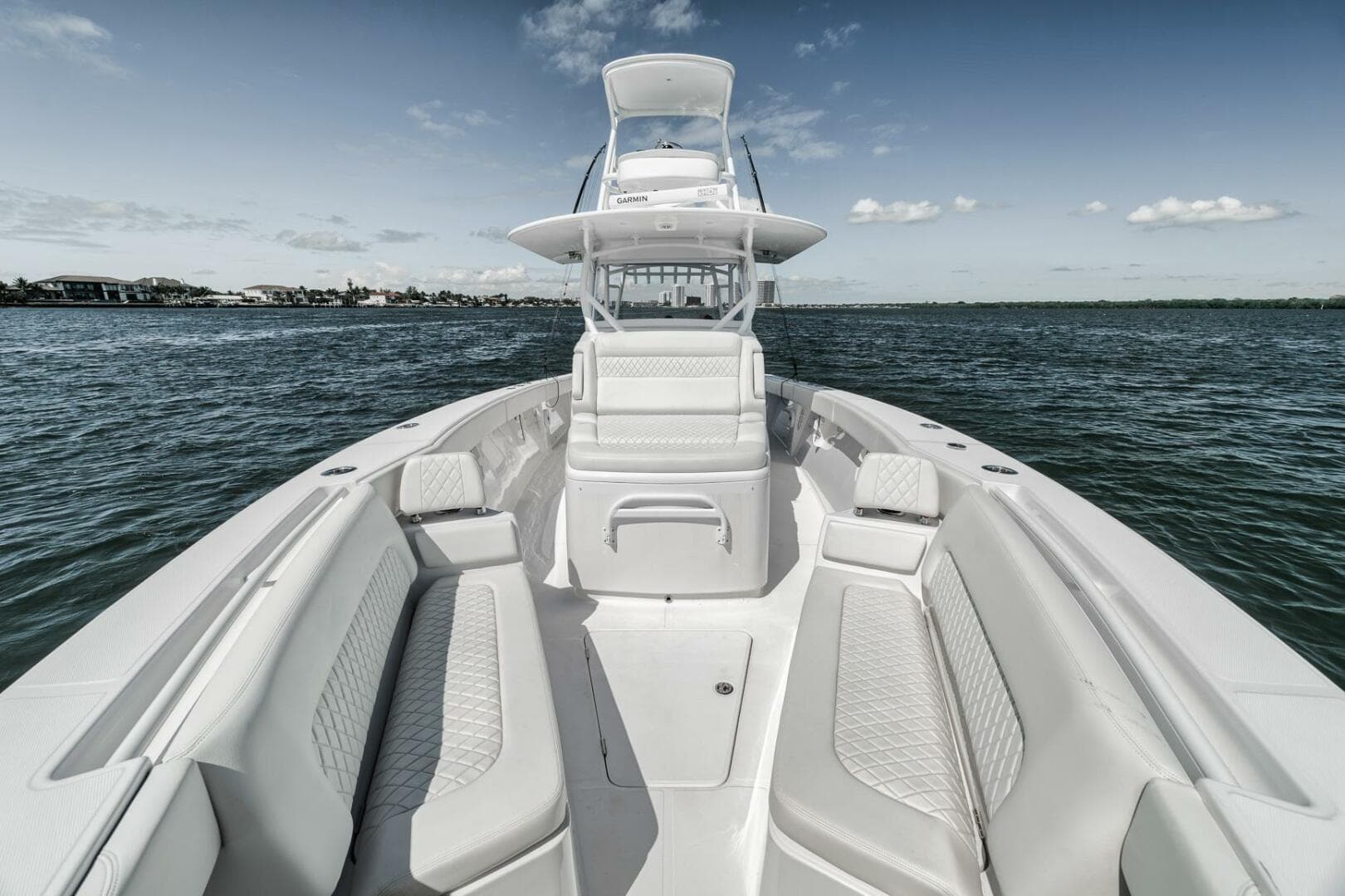 2023 Jupiter 40 boat with spacious seating on open water.