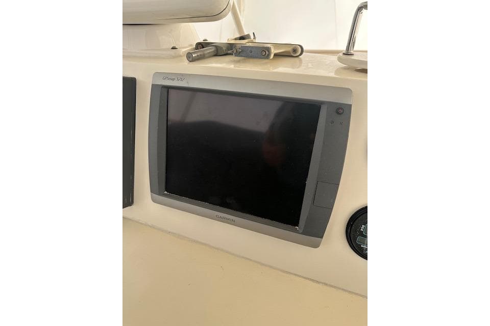 Garmin GPS display on 1989 Viking 41 Sportfish Convertible boat dashboard.