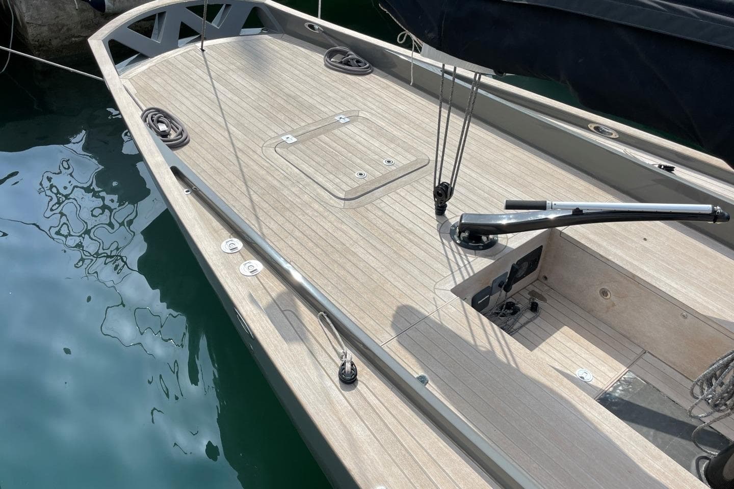 Deck of 2009 Wally Wallynano 37 sailboat with sleek wooden finish.