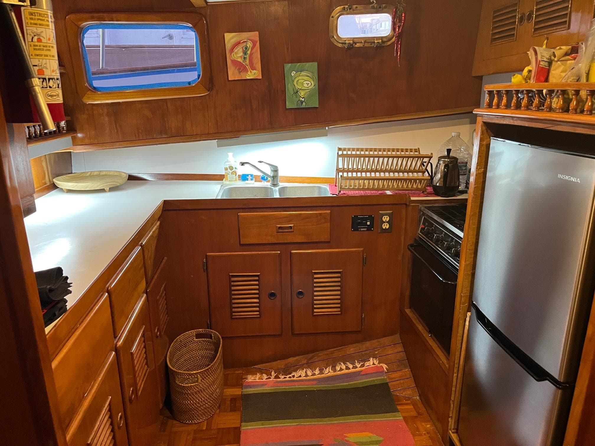 1978 Marine Trader 44 Aft Cabin kitchen with wood cabinets and modern appliances.