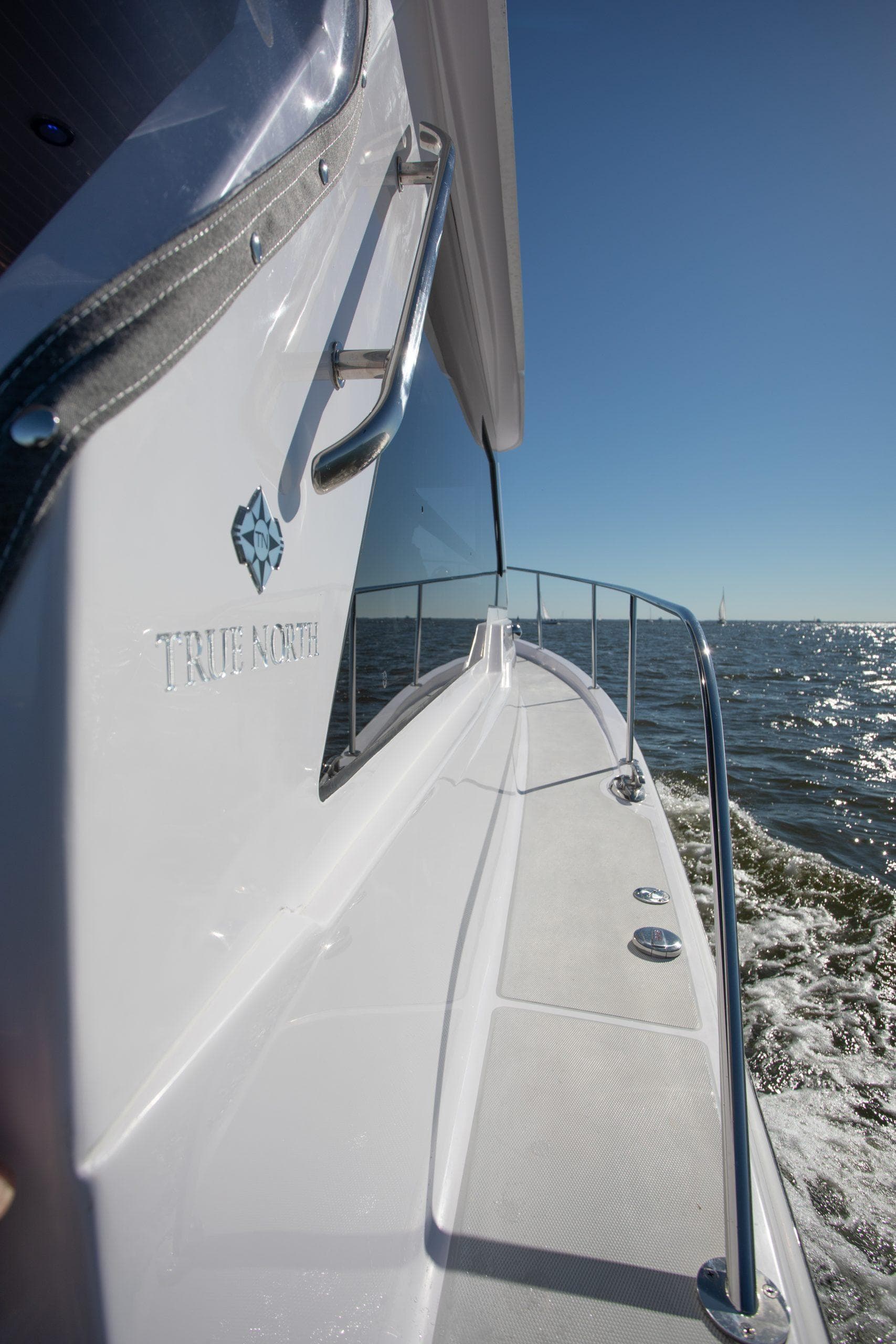 2024 True North 34 boat cruising on open water.