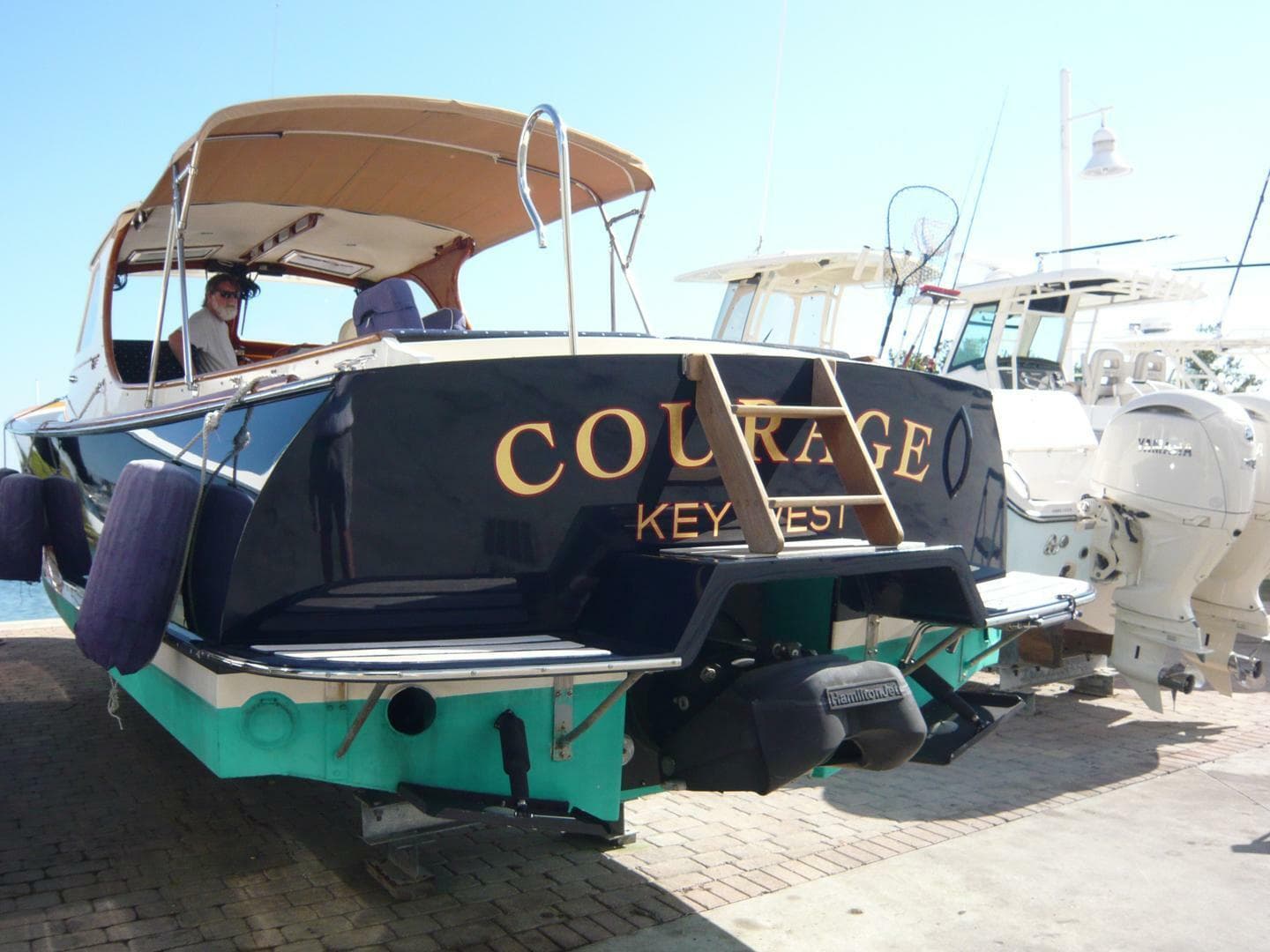 Hinckley 36 Classic 1998 boat named "Courage" docked in Key West marina.