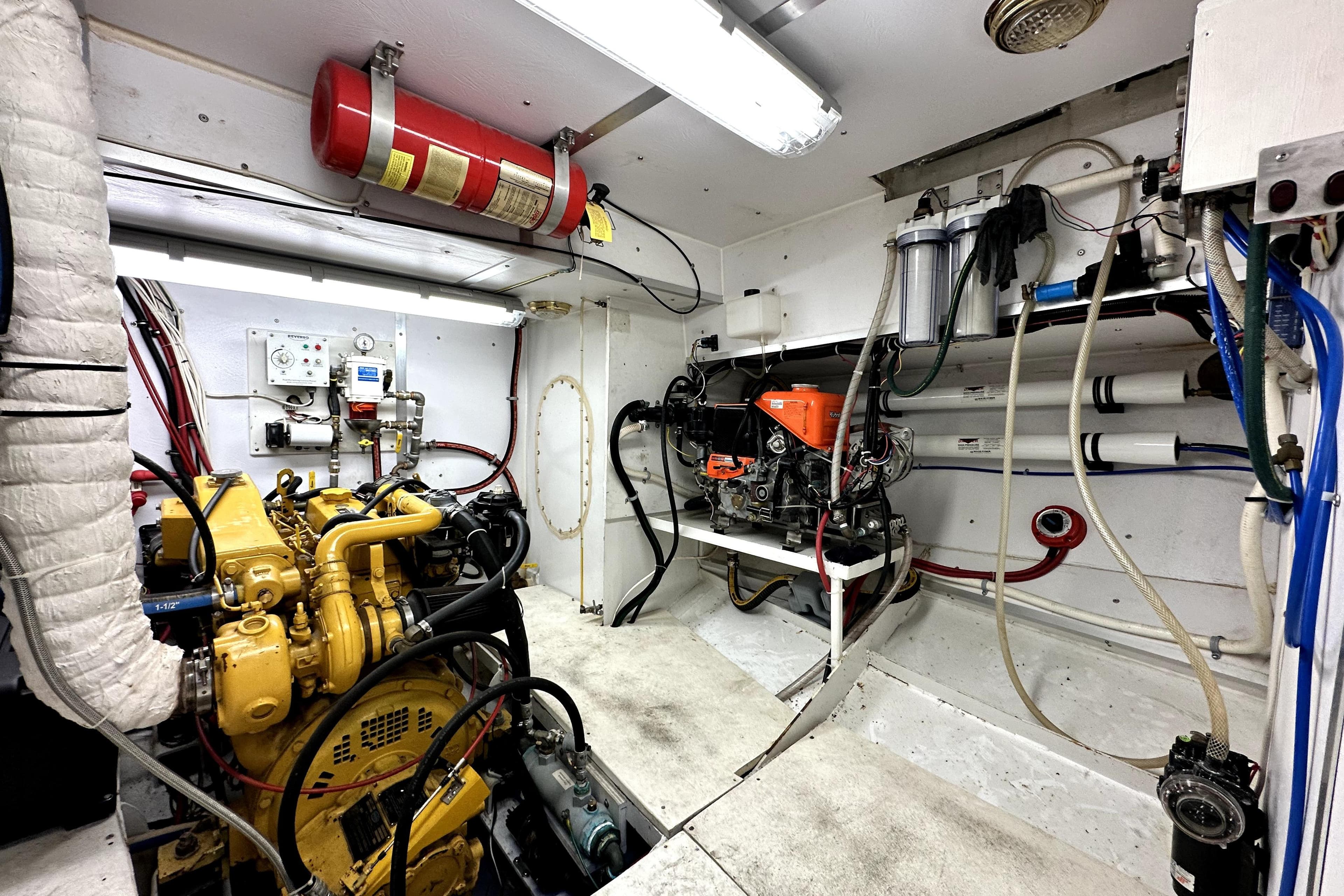 Engine room of 2012 Custom Pacific Northwest 43 yacht, featuring machinery and equipment.
