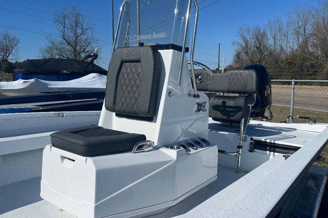 2026 Xpress H22B Bay boat with sleek seating and modern design.