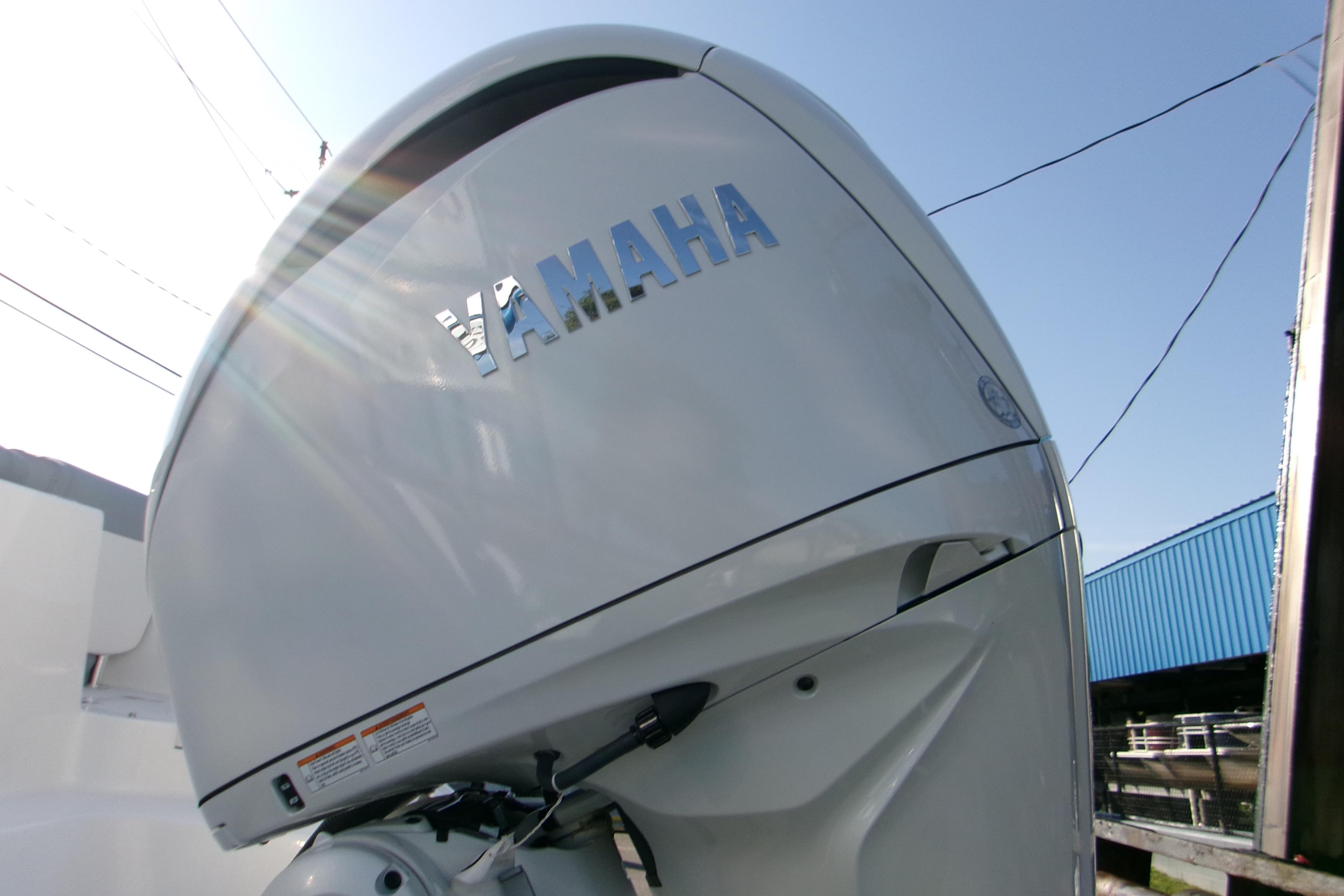 2026 Sportsman Heritage 231 Center Console with Yamaha outboard engine.
