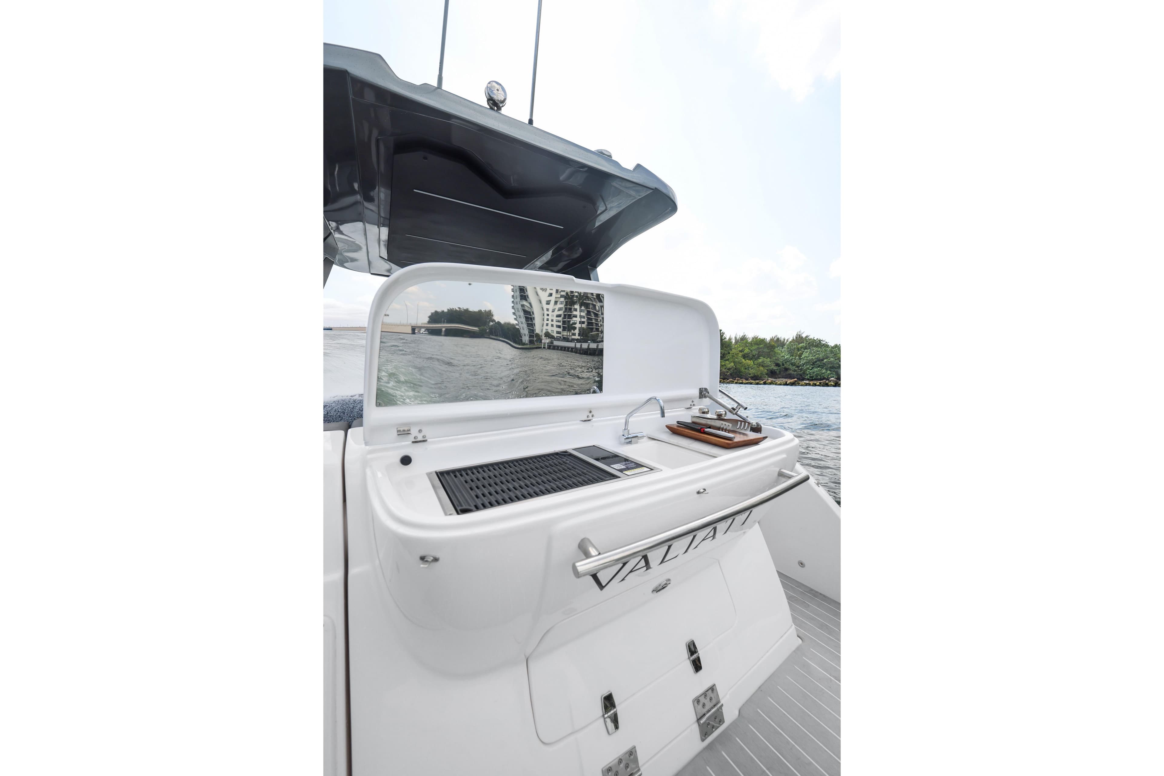 2025 Valiatt 350GT yacht with outdoor kitchen and scenic water view.