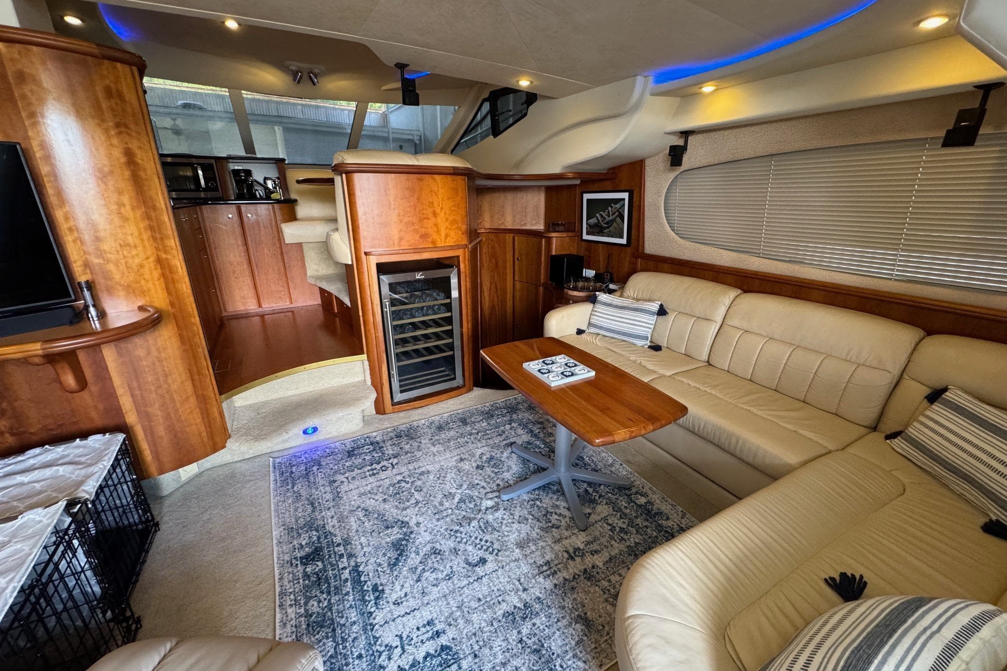 Luxurious 2003 Silverton 410 Sport Bridge interior with leather seating and modern amenities.