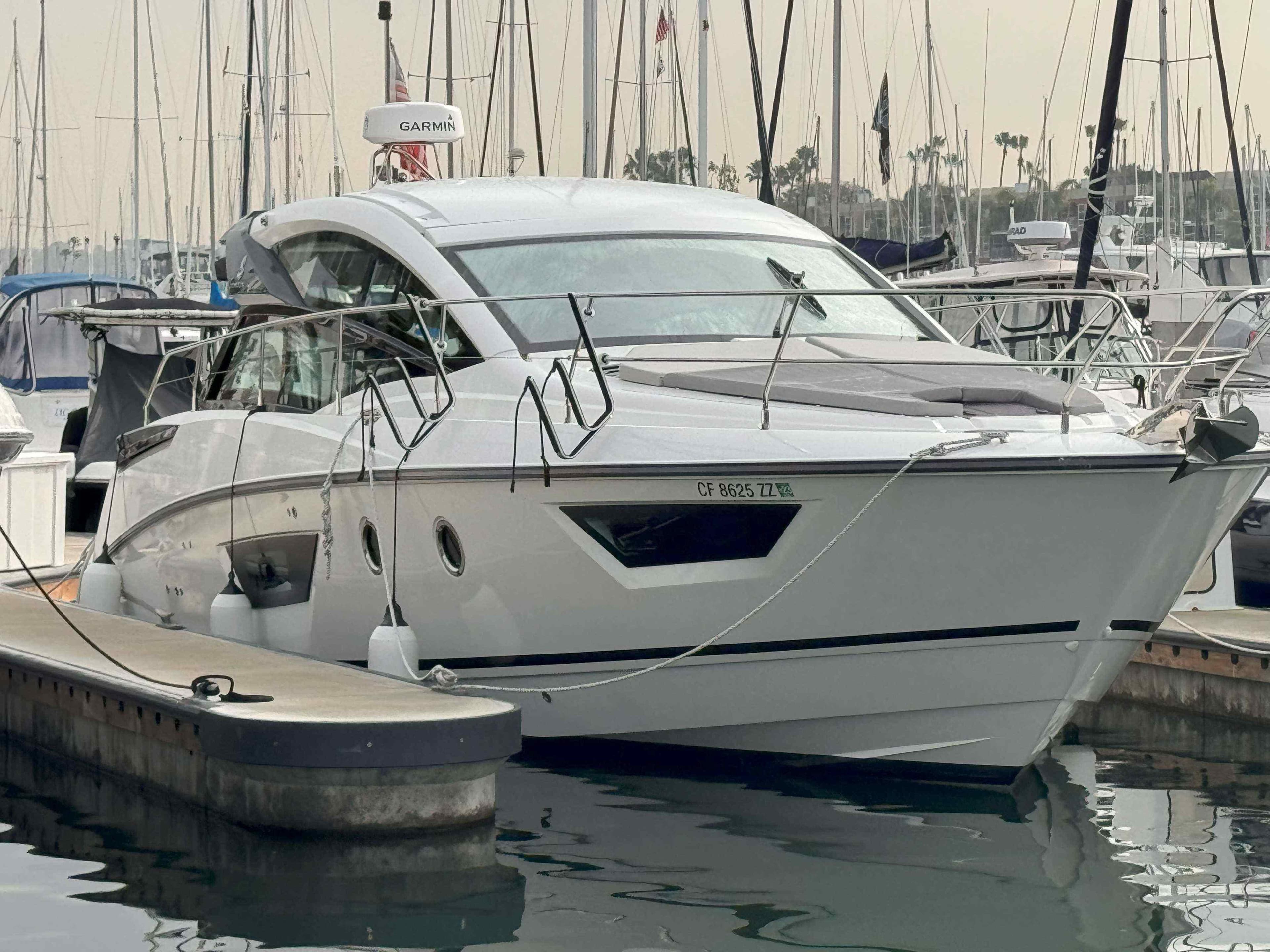 2021 Beneteau Gran Turismo 40 yacht docked at marina.