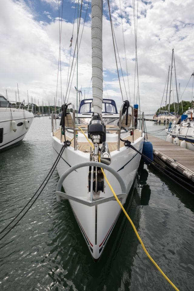 2019 Southerly 480 yacht docked at marina, front view with mast and rigging.