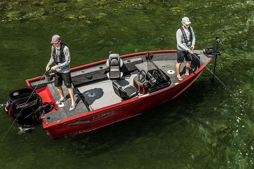 Manufacturer Provided Image: 2026 Lund 1775 Adventure SS boat with two people fishing on calm water.