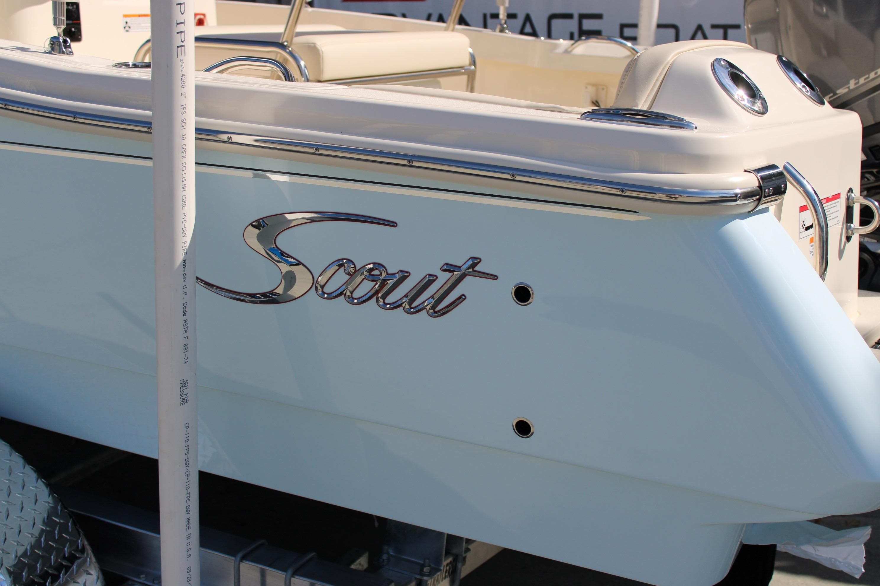 2026 Scout 188 Sportfish boat with sleek design and chrome accents.