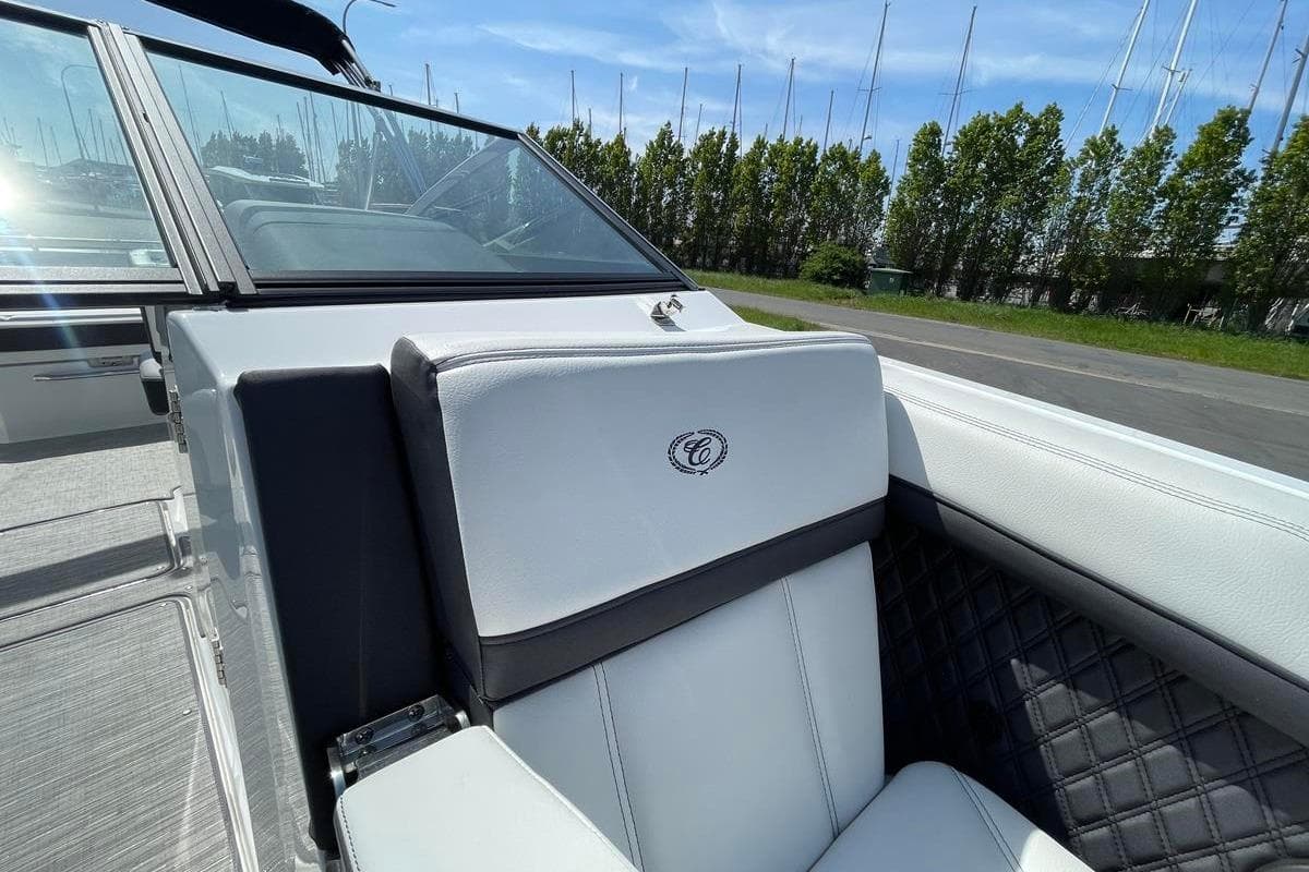 2021 Cobalt R6 boat interior with white leather seating and quilted accents.