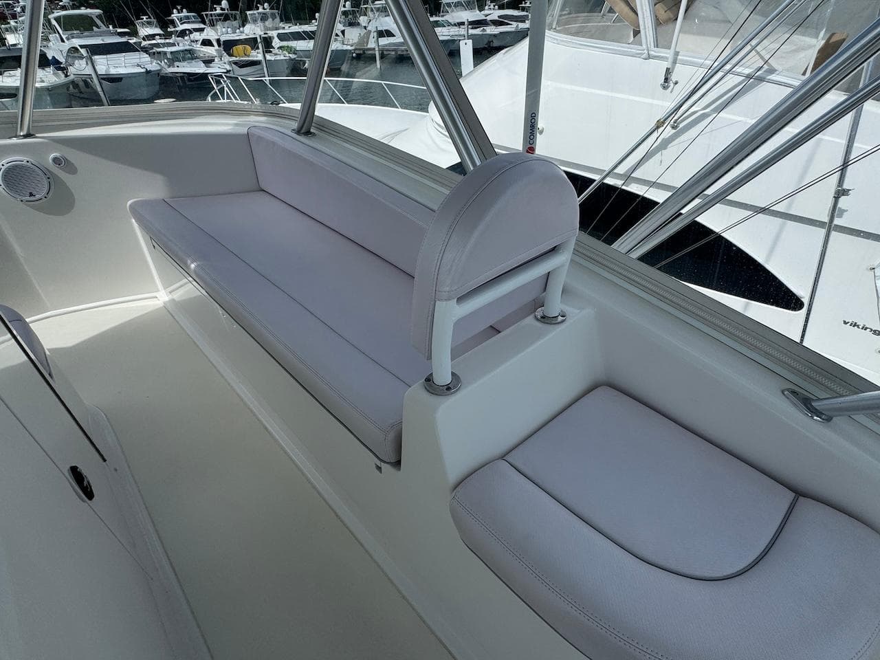 2007 Viking 52 Convertibles yacht interior with white seating and sleek design.