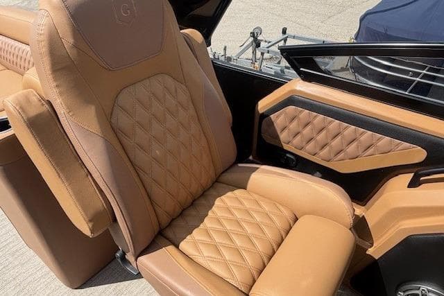 Luxurious tan leather seat in 2025 Godfrey San Pan SP2700SBW boat.