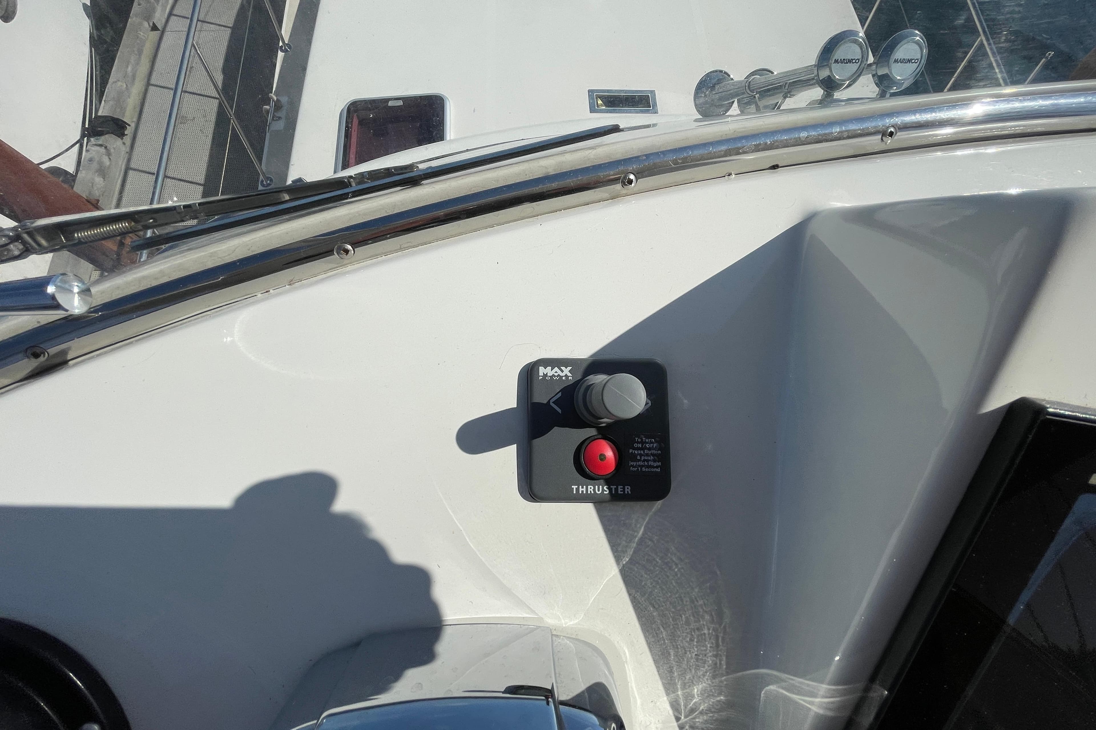 Control panel on a 1979 Canoe Cove 53 yacht, featuring a thruster control.