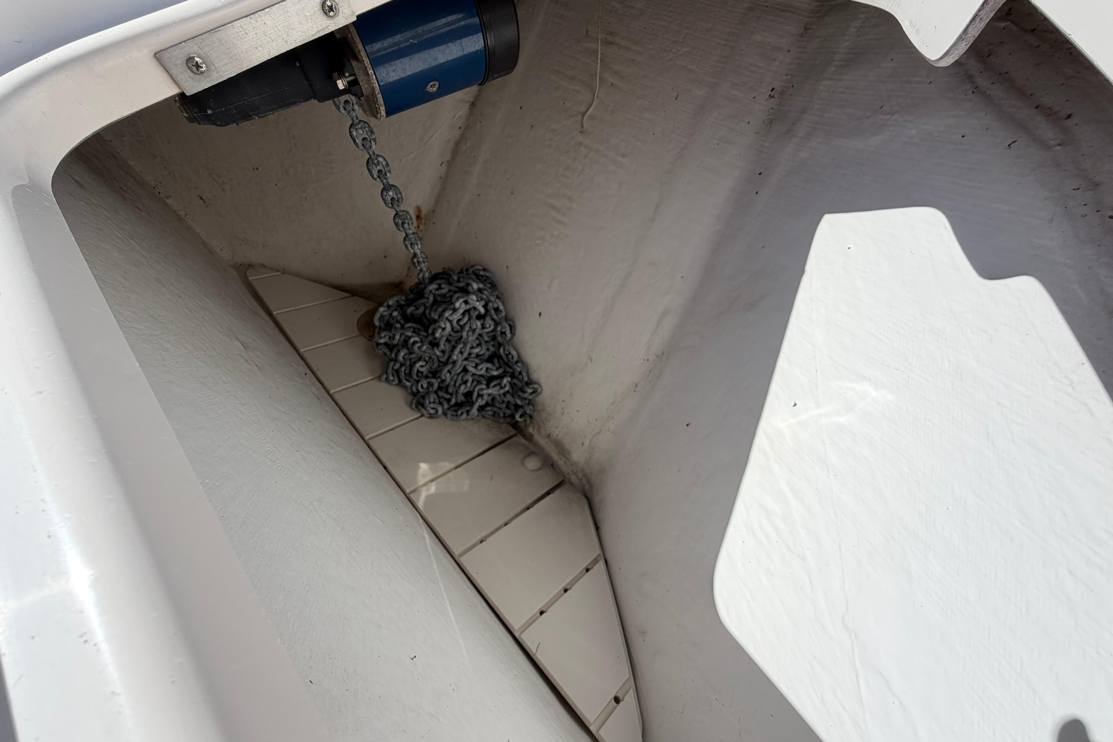 Anchor chain compartment of 2005 Tiara Yachts 3600 Sovran boat.
