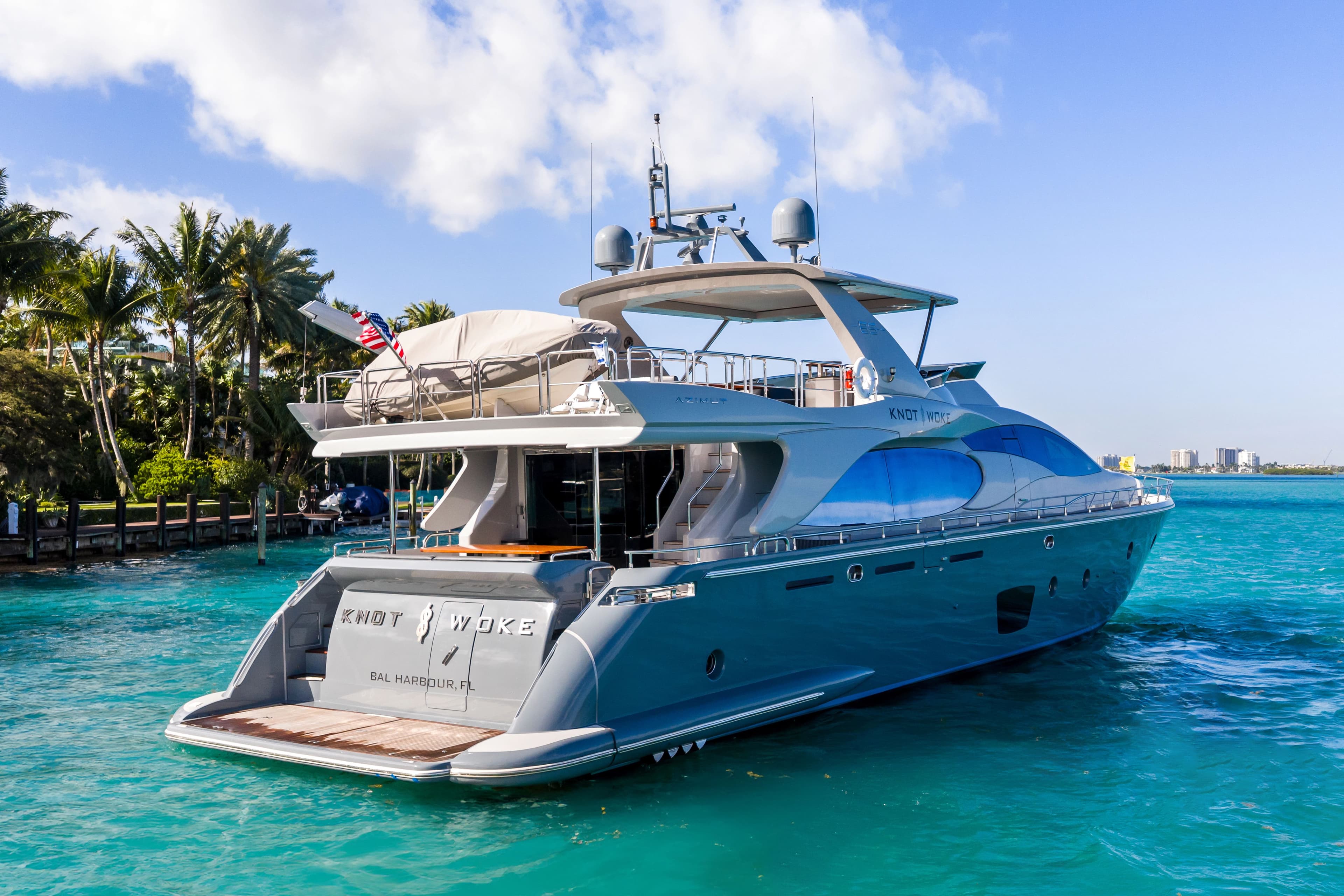 Azimut Flybridge 85 Yacht from 2009 on blue water.