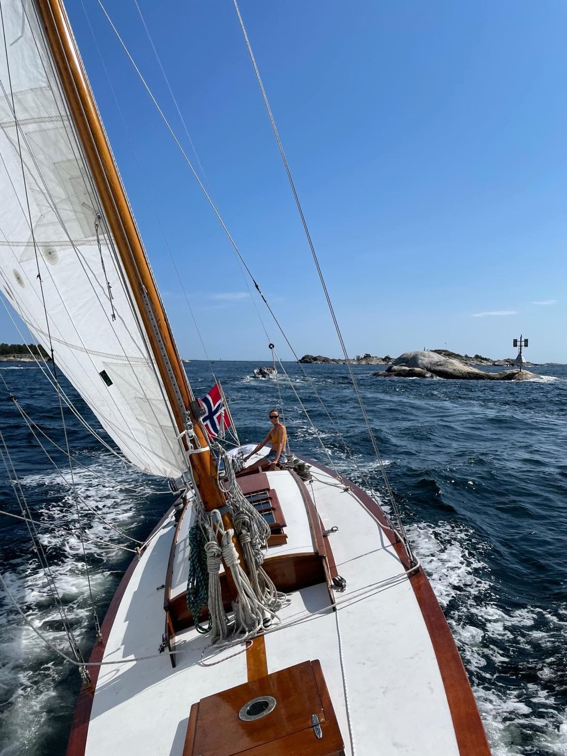 Anker & Jensen 8mR sailboat from 1914 on open sea.
