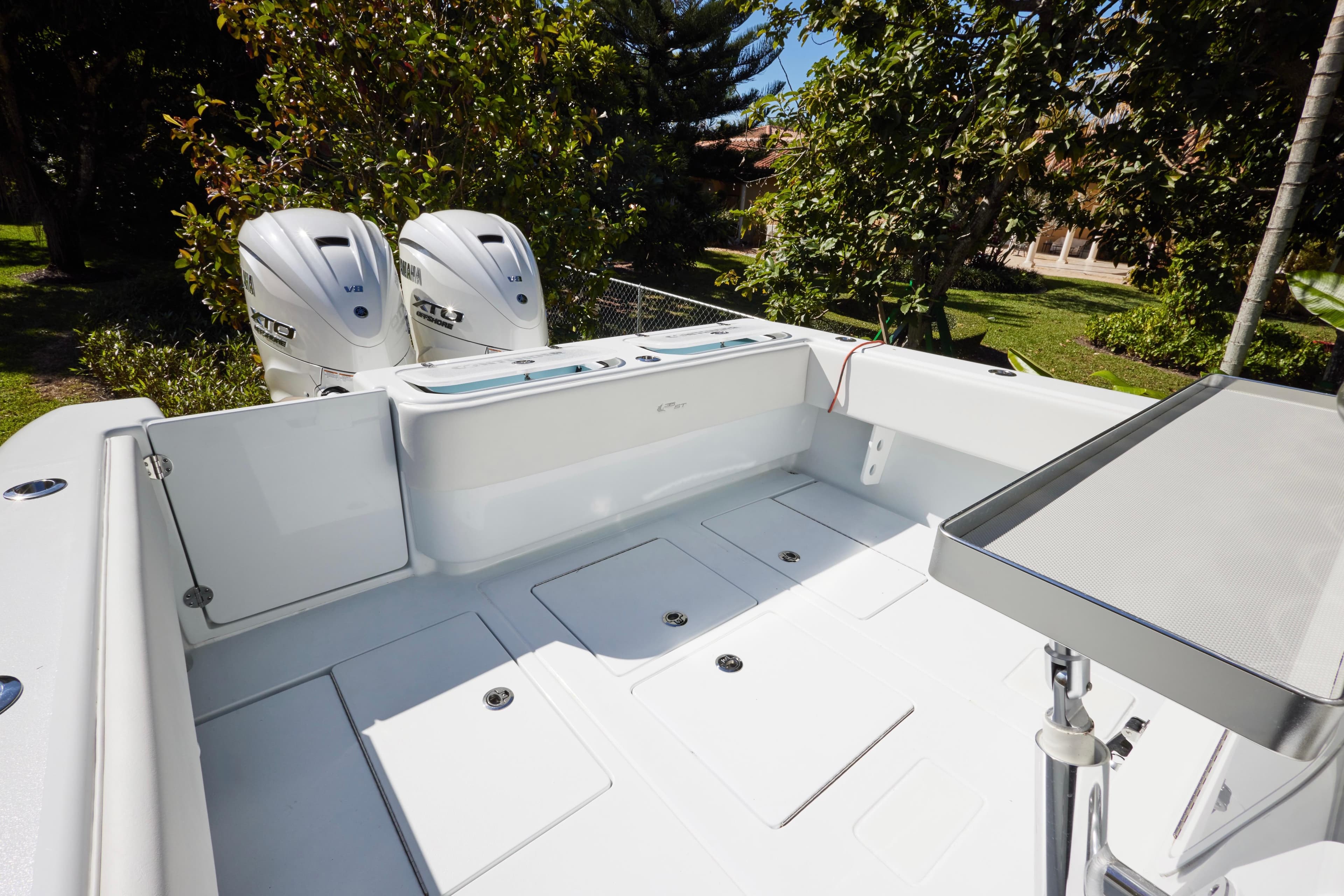 2024 Contender 35 ST boat with dual Yamaha V8 engines, spacious deck, and sleek design.