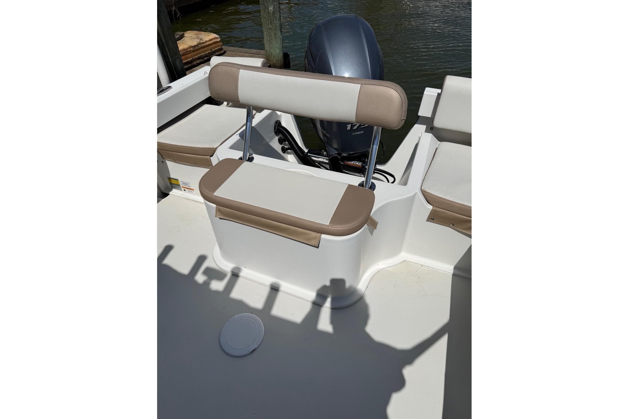 2019 Parker 2150 boat interior with seating and motor view.