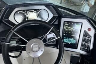 2018 MasterCraft XStar dashboard with steering wheel and digital display.