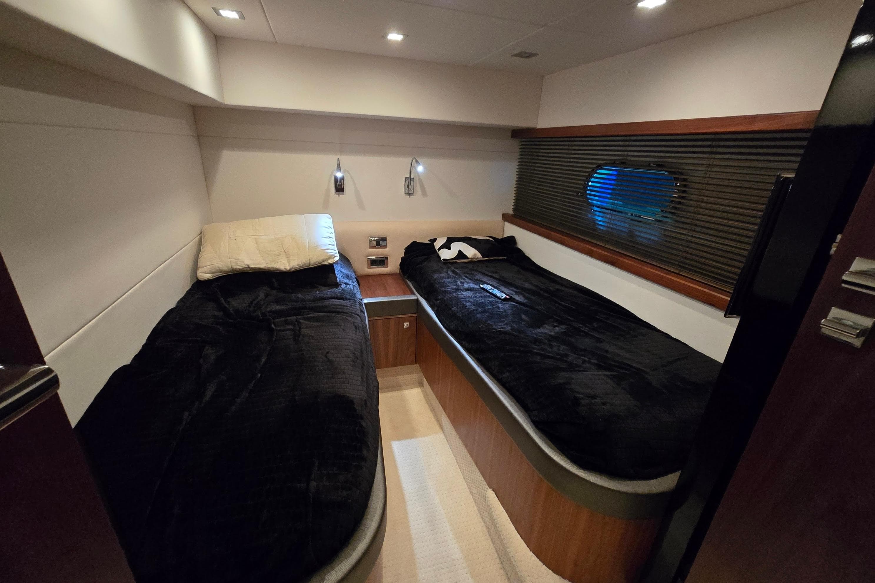 Luxurious twin cabin interior of 2011 Sunseeker Predator 54 yacht.