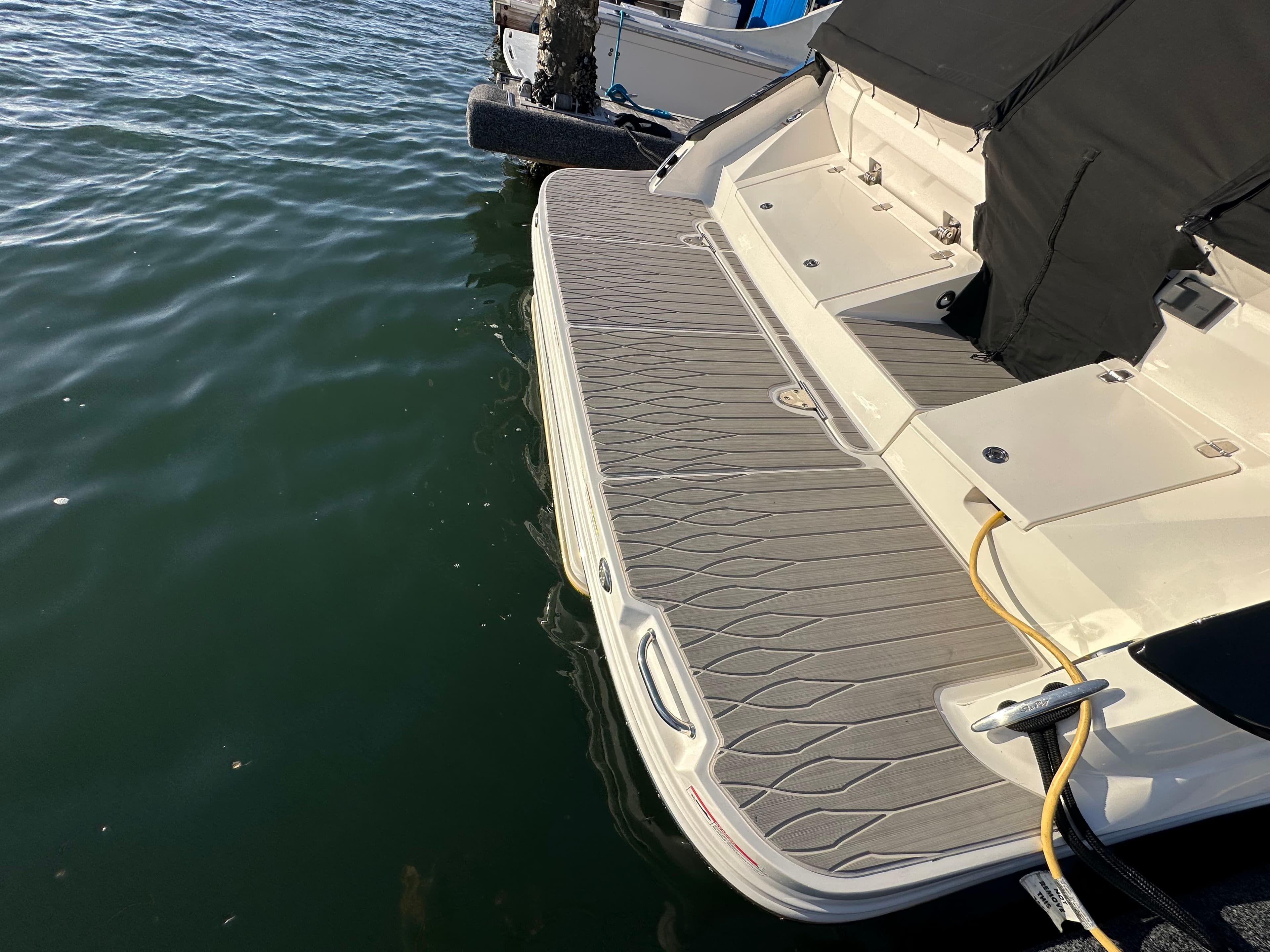 Seadec mat on swim platform electric drop down swim