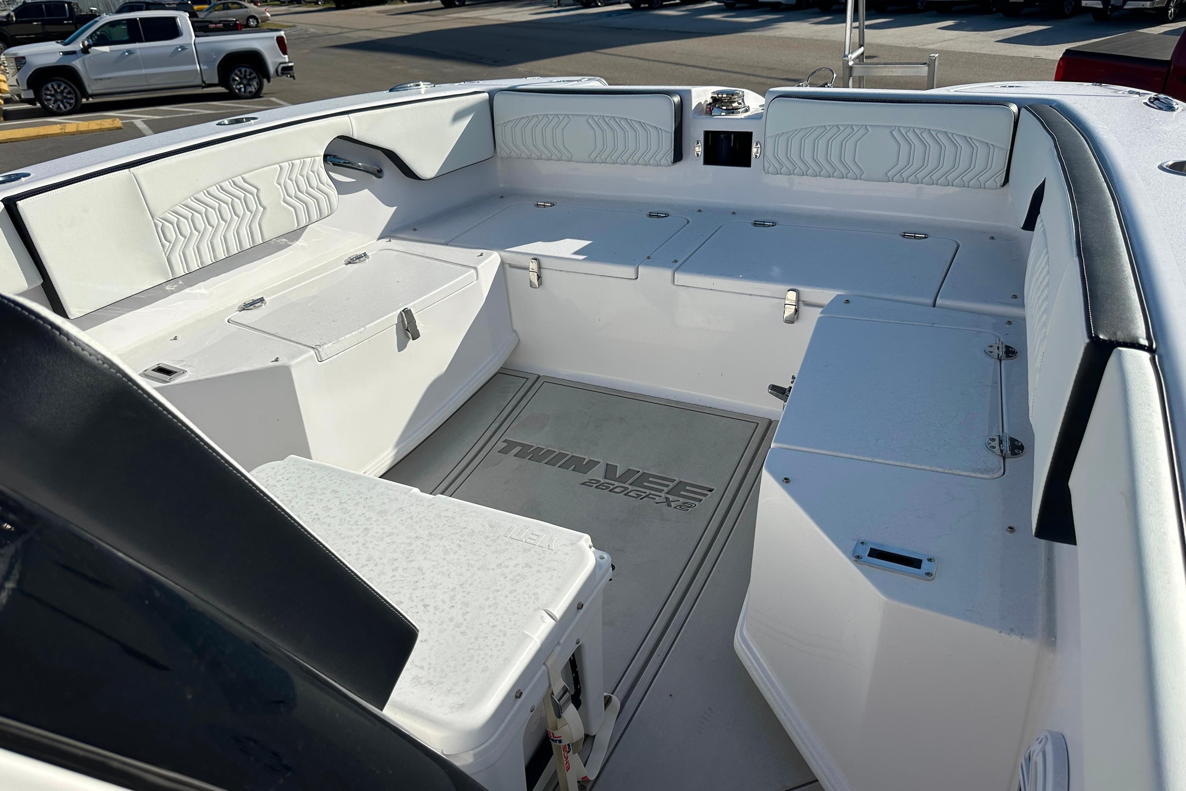 2026 Twin Vee 260 GFX2 CC boat interior with spacious seating and storage compartments.